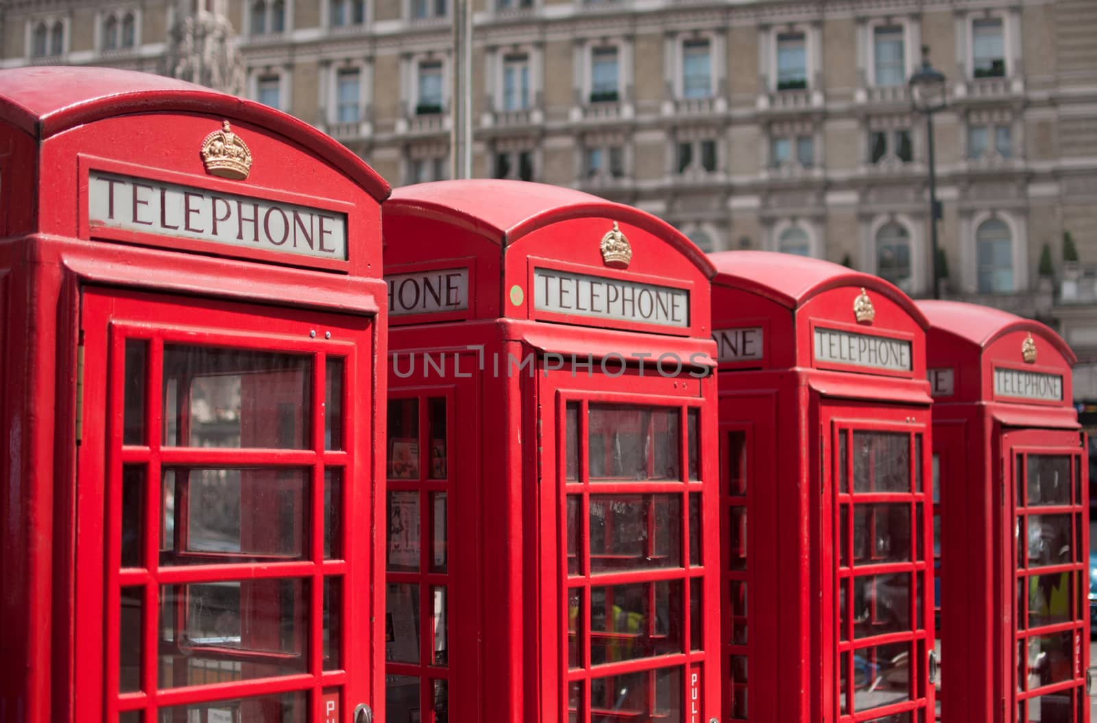 Row of red telephone boxes