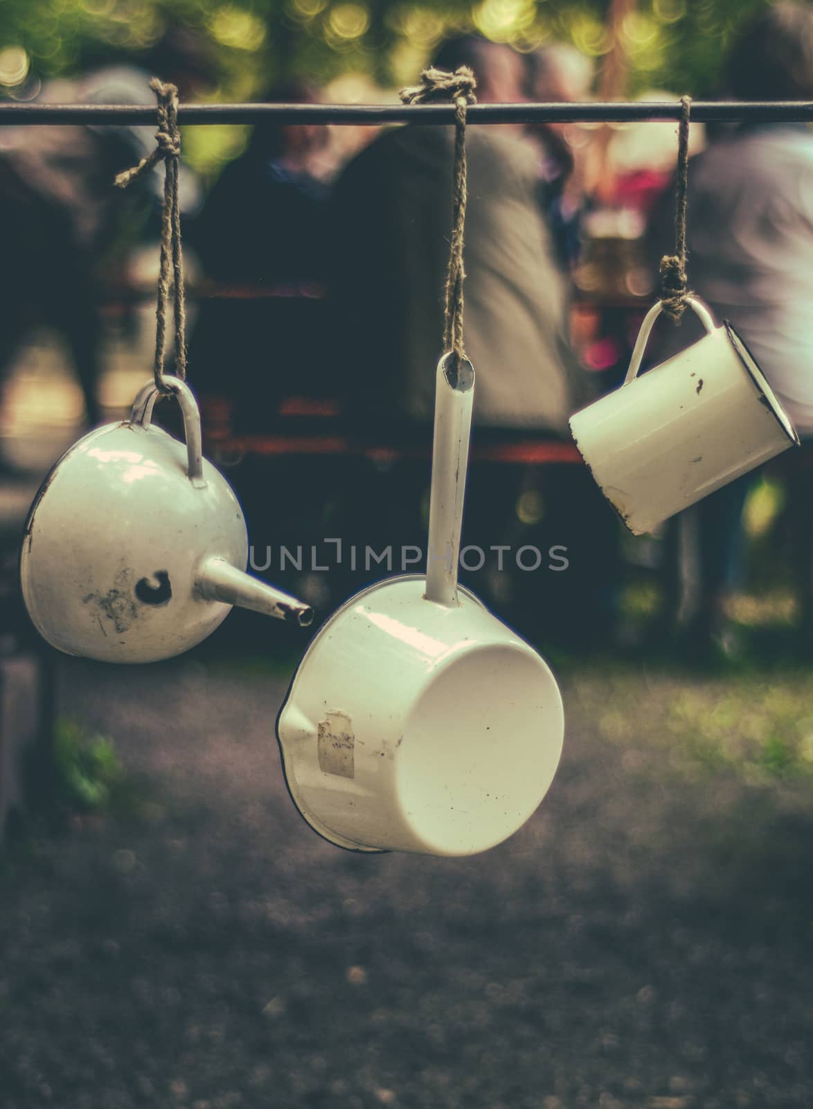 Retro Styled Vintage Camping Crockery Hanging At A Campsite