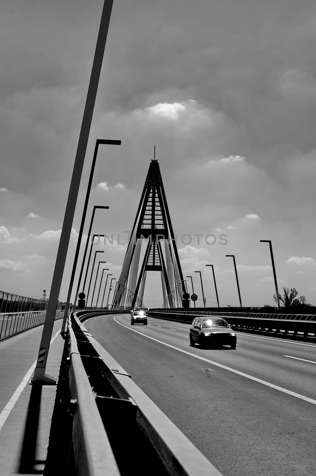 Traffic on modern bridge by anderm