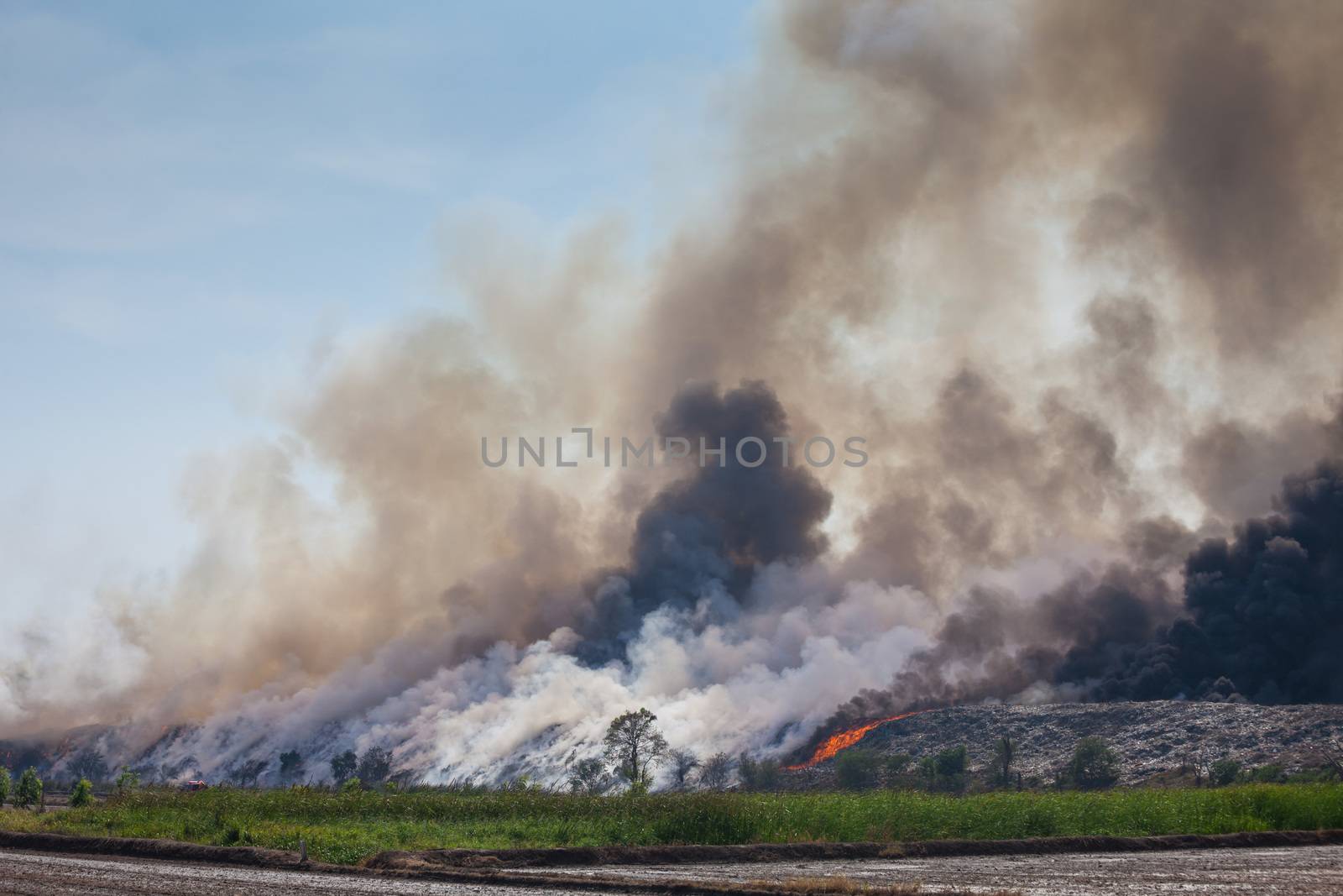 Burning garbage heap of smoke from a burning pile of garbage