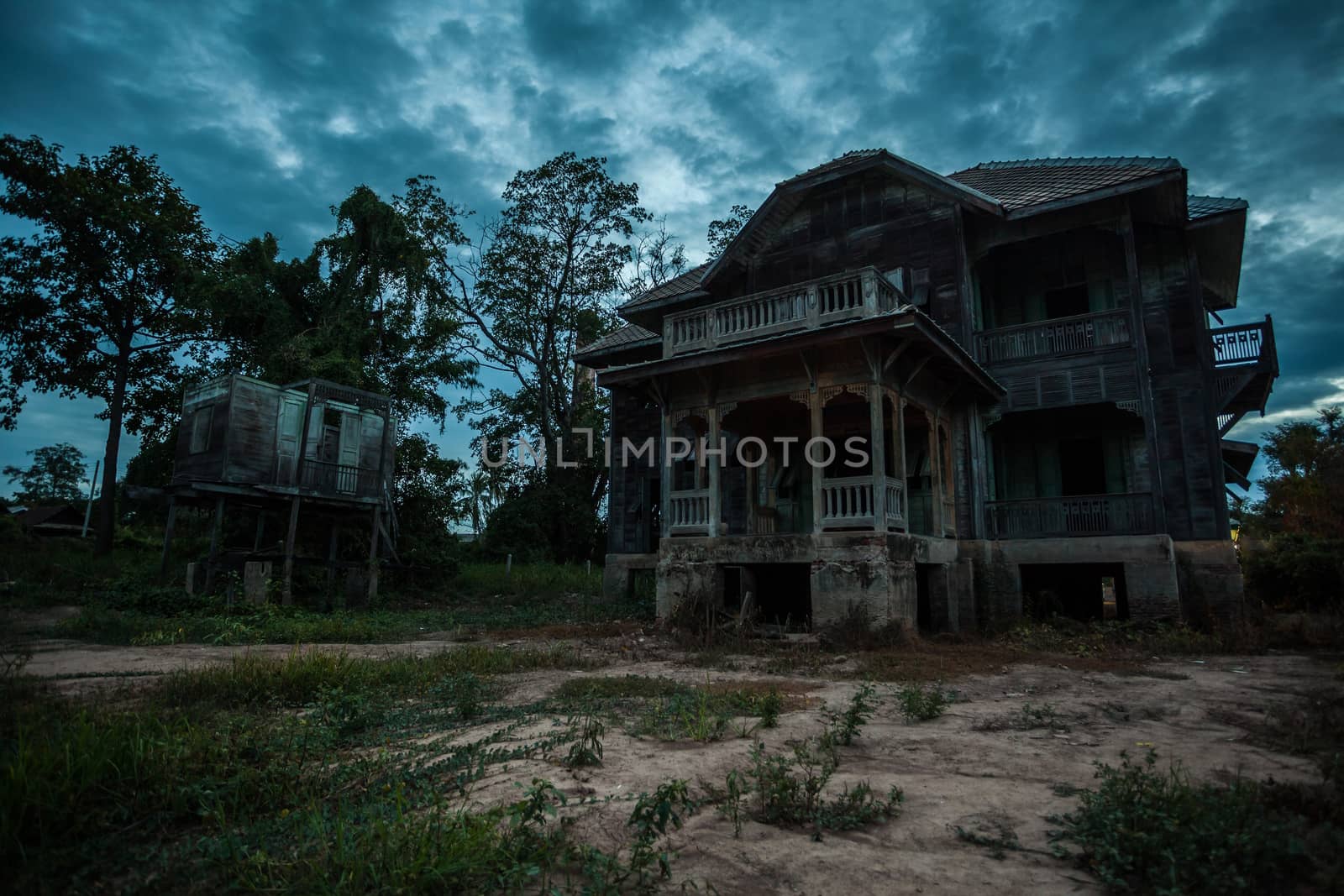 abandoned wood old house on twilight