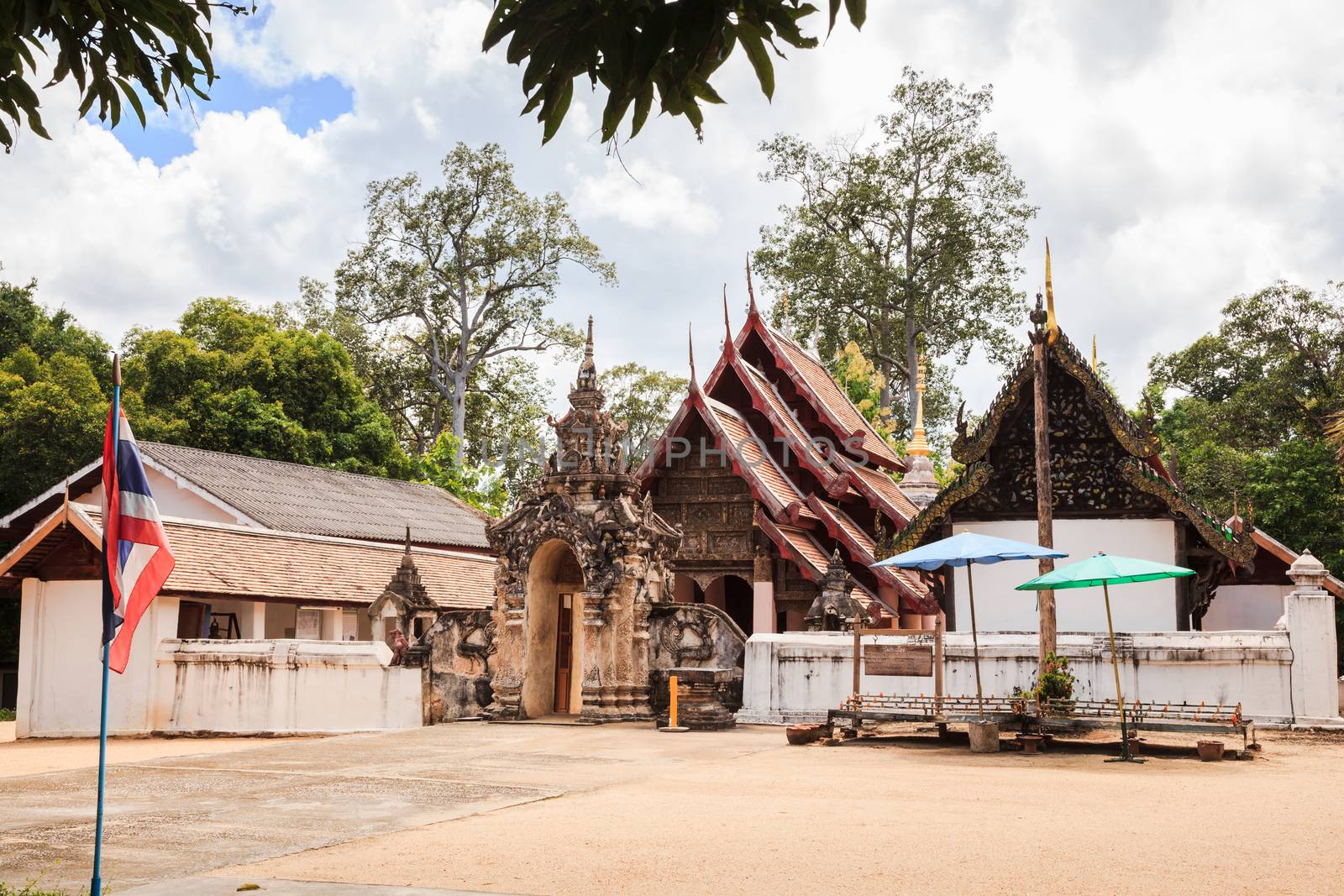 Ancient lanna style temple that having very beautiful carving at  facade of the viharn