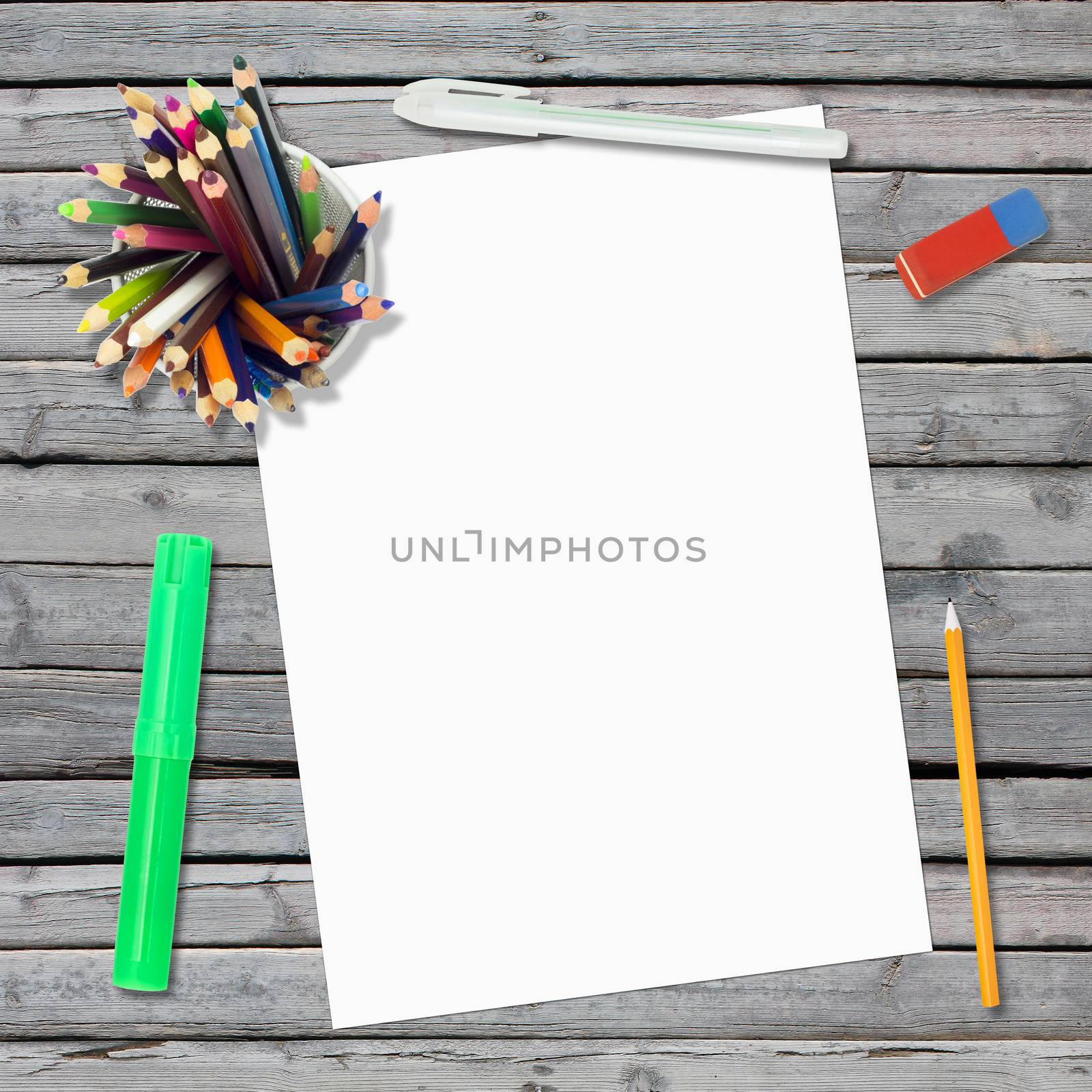 Lie on wooden floor empty paper sheet and stationery. Education concept