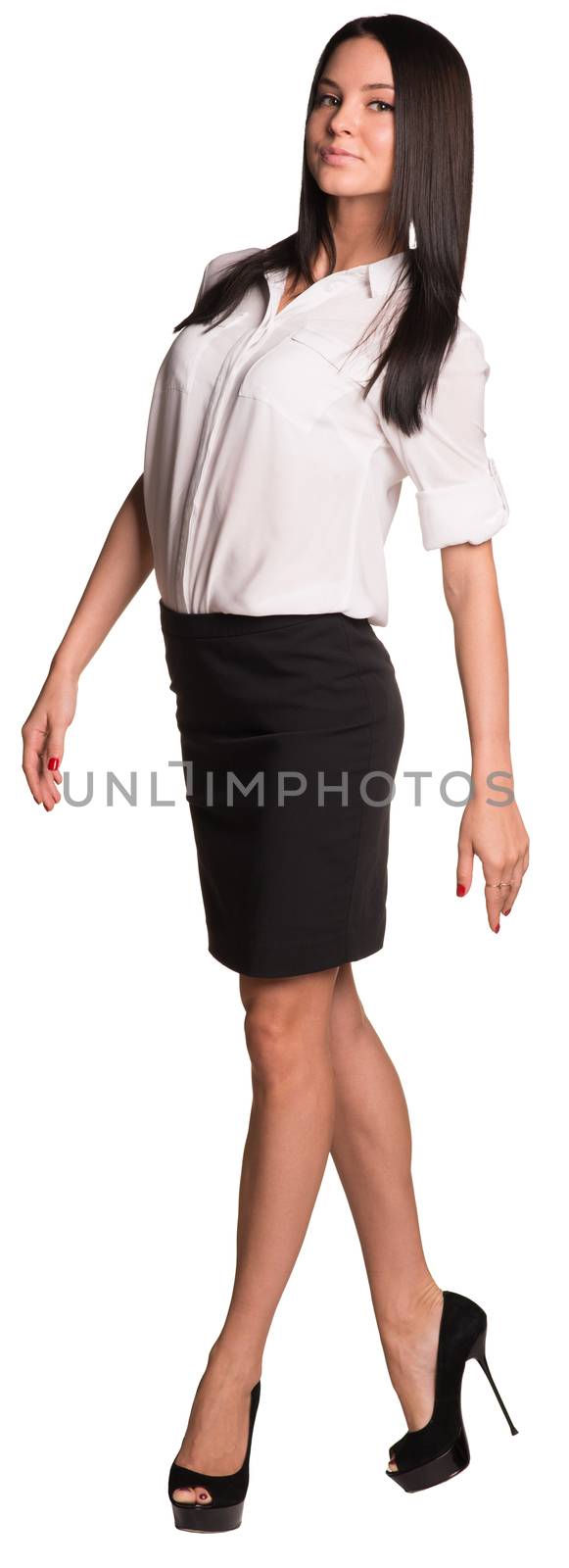 Beautiful businesswomen in blouse and skirt walks forward by cherezoff