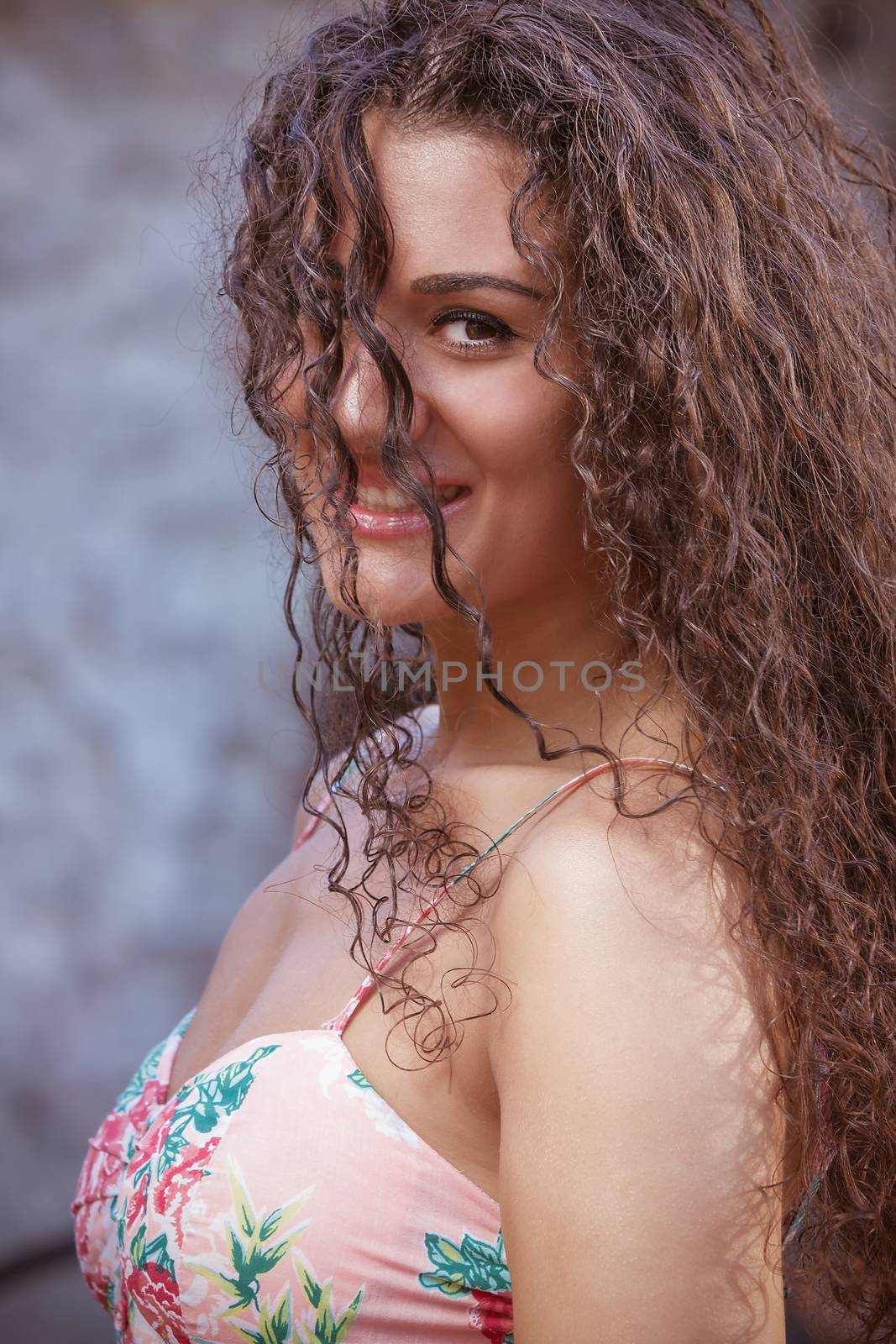 Curly hair woman portrait outdoor by Slast20