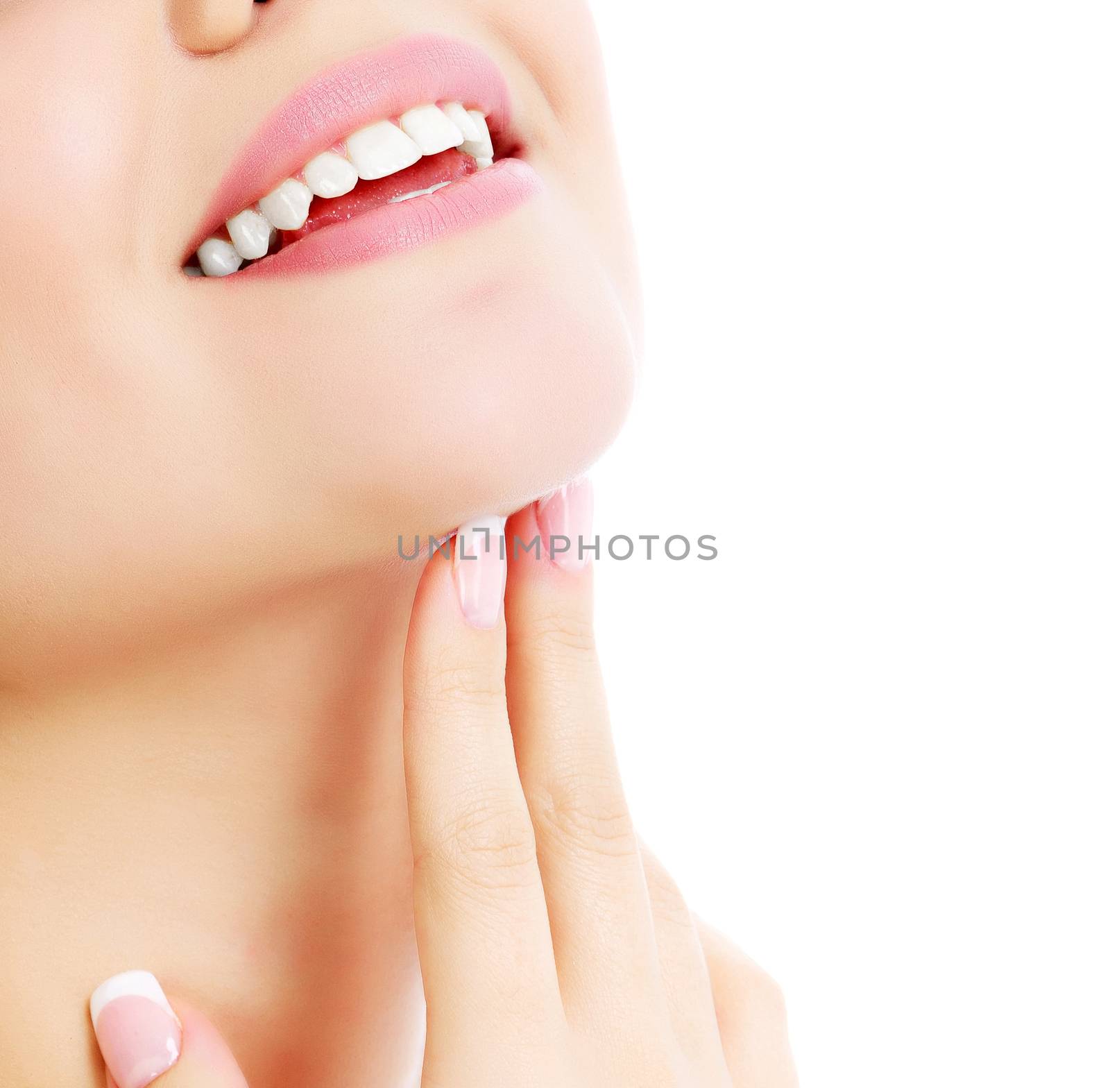Cheerful female with fresh clear skin, white background, copyspace