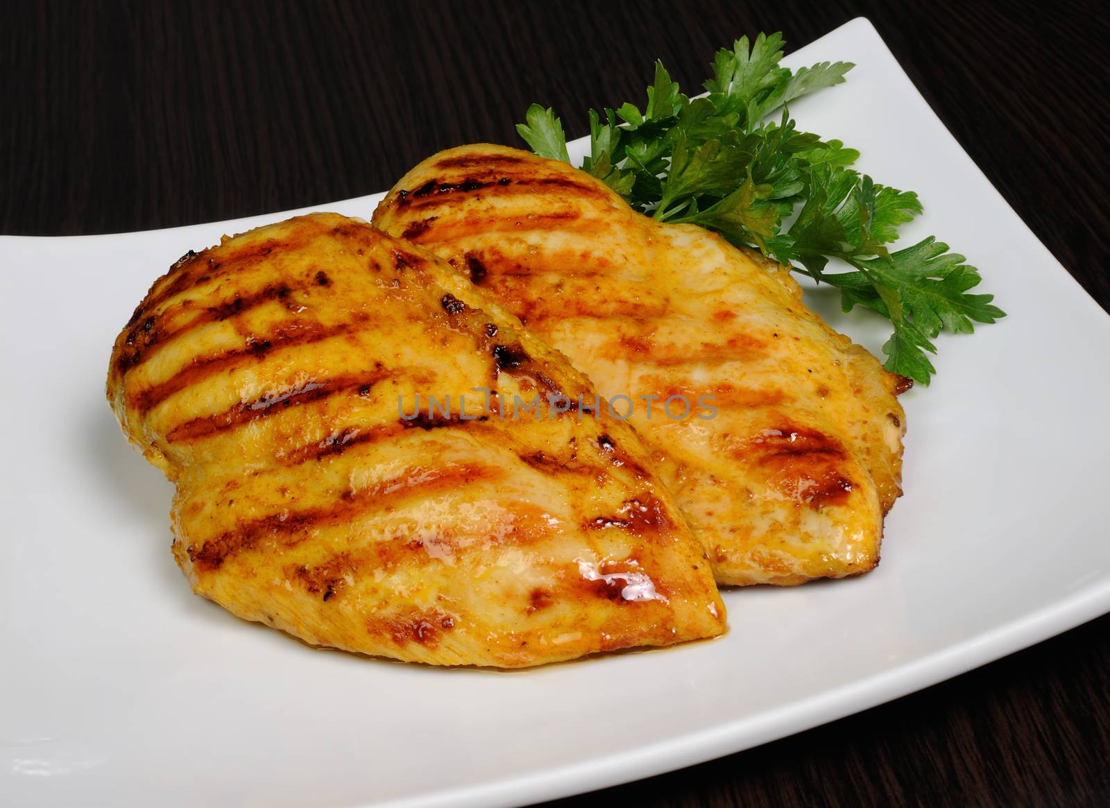 grilled piece of roasted chicken schnitzel