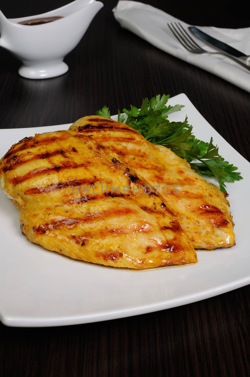 grilled piece of roasted chicken schnitzel