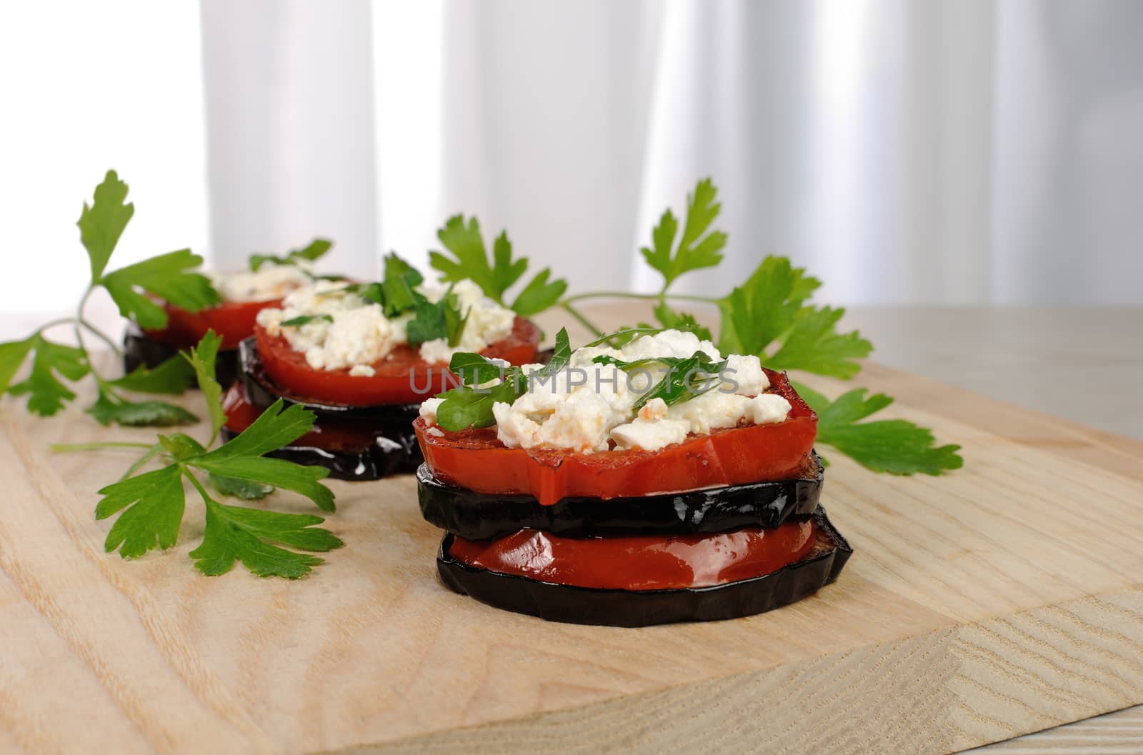 Baked eggplant with ricotta and tomato