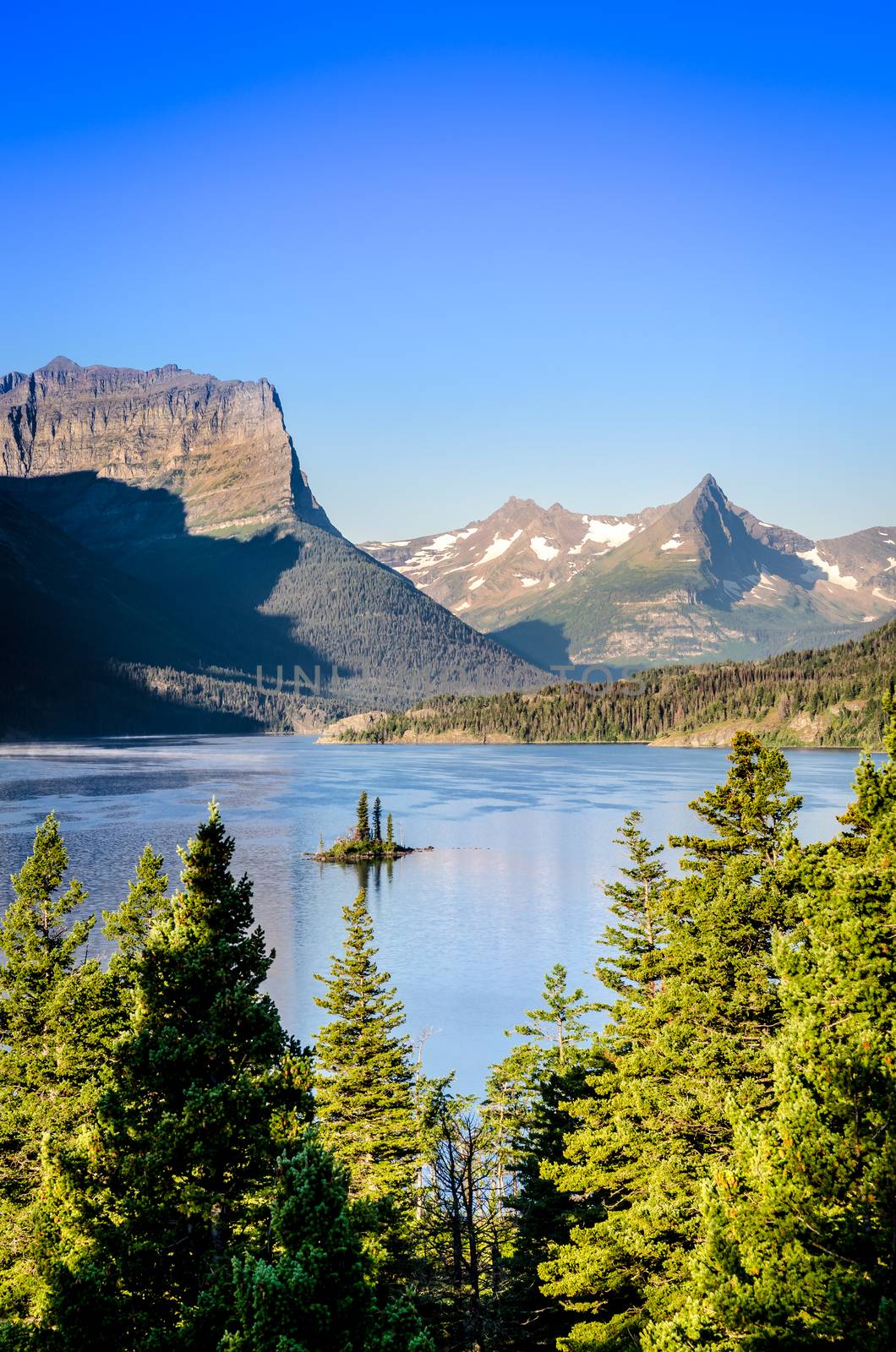 Vertical landscape view of mountain range in Glacier NP, USA by martinm303