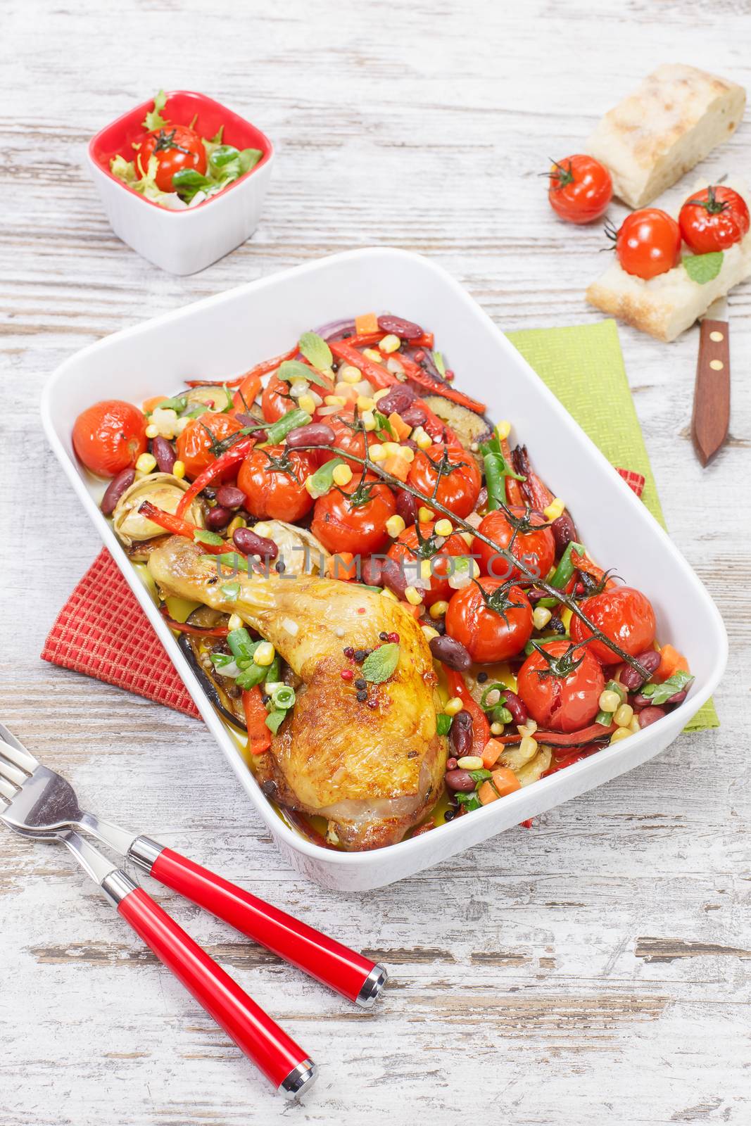 Baked Chicken with Cherry Tomatoes , vegetables and spices