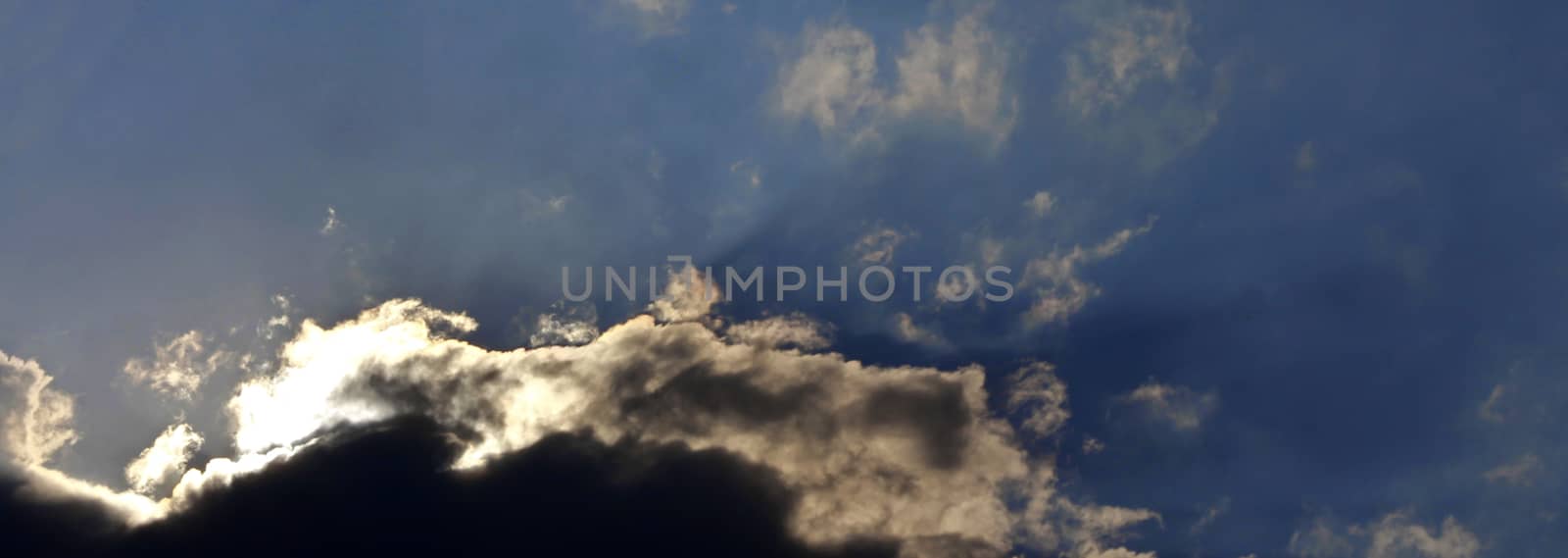 Blue sky and white clouds and the sun