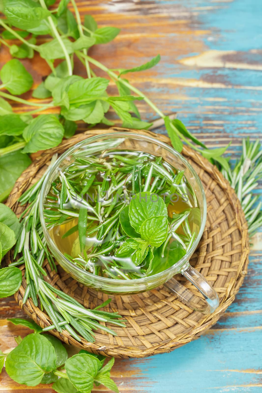 Rosemary Mint Tea with fresh rosemary and mint leaves. Macro, selective focus