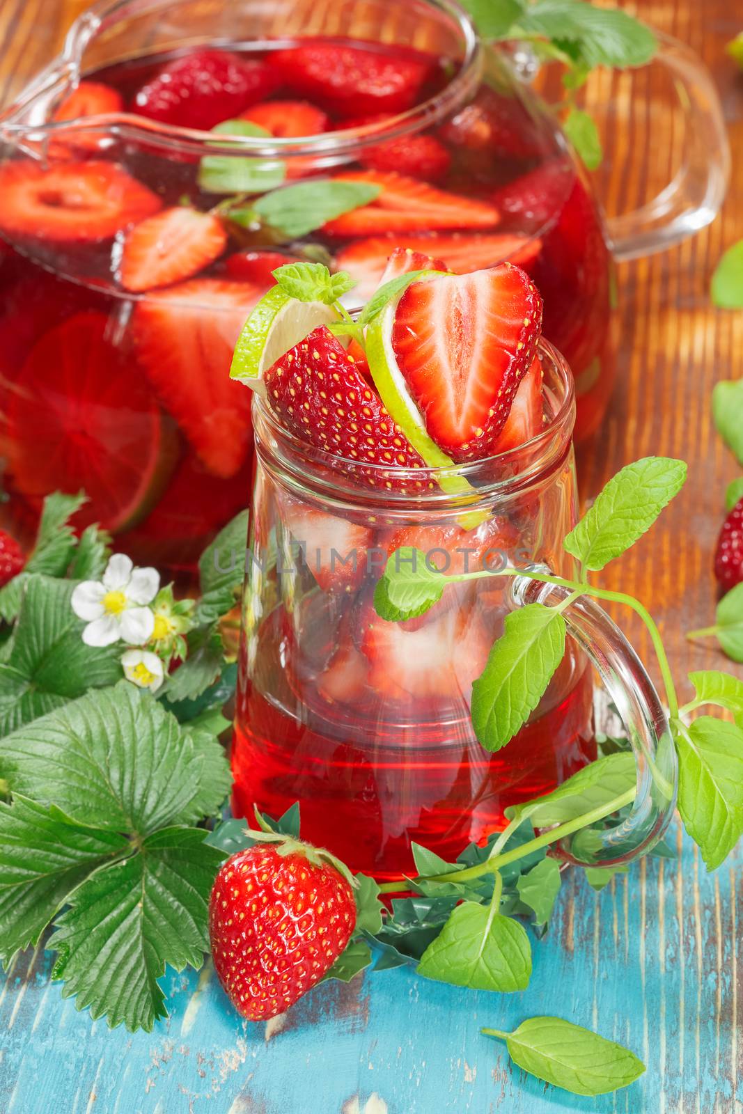 Strawberry juice with fresh strawberries and lime
