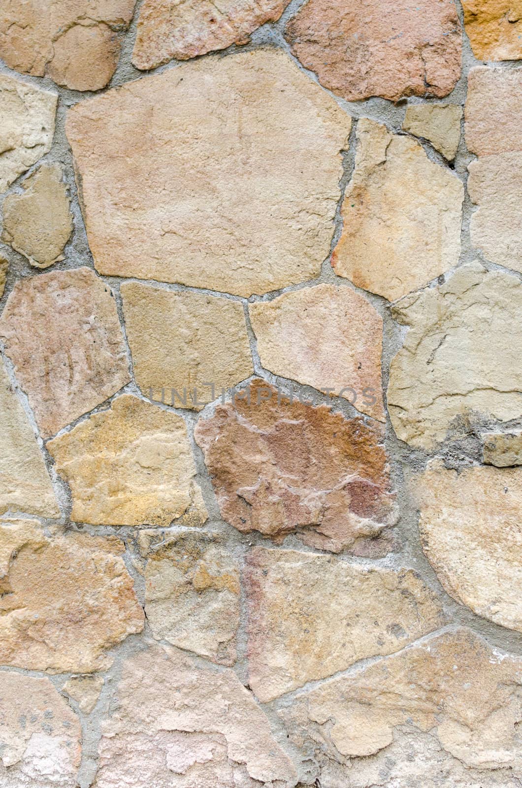 wall of stones as a texture and background .