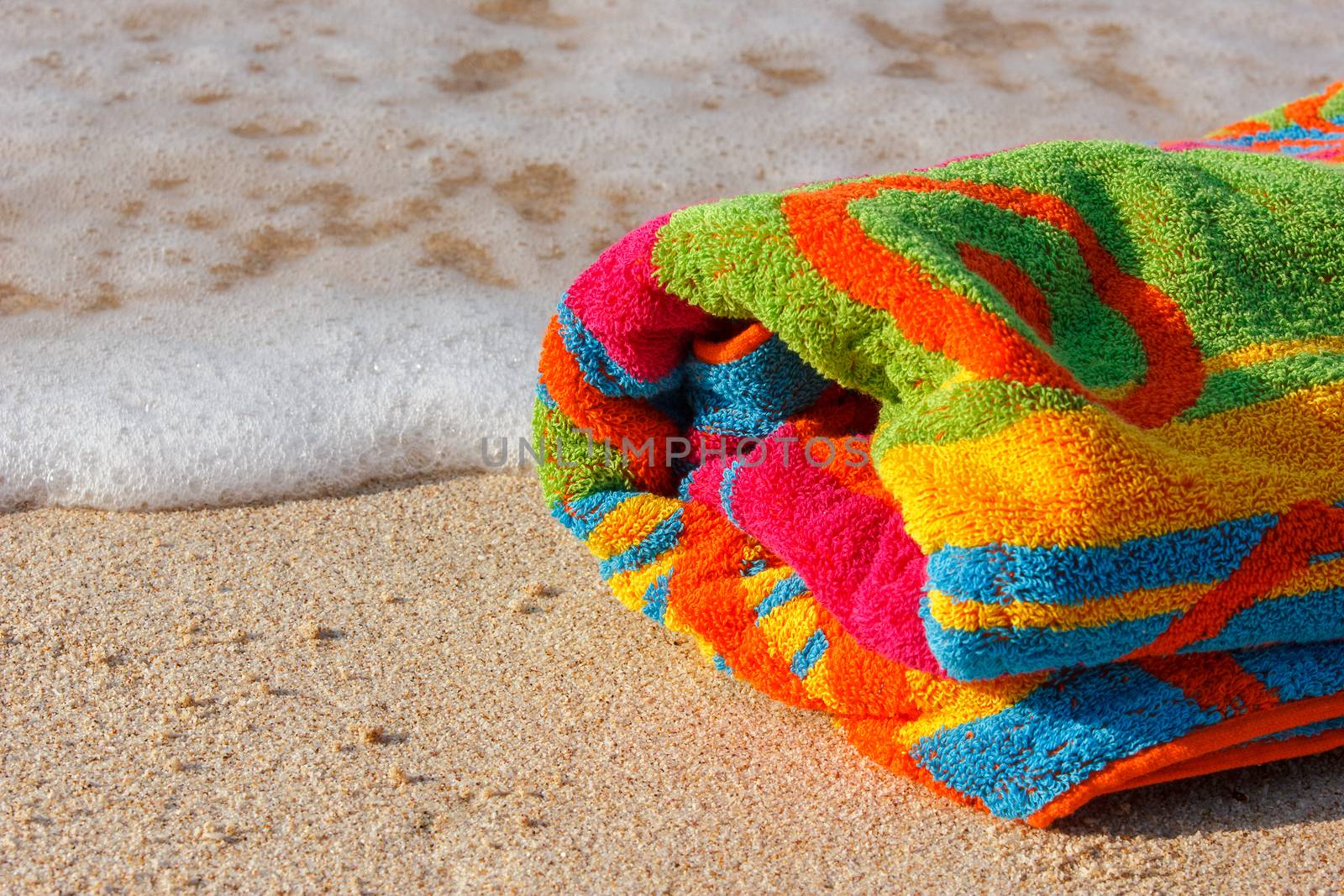 towel beach on the sandy beach with space for text