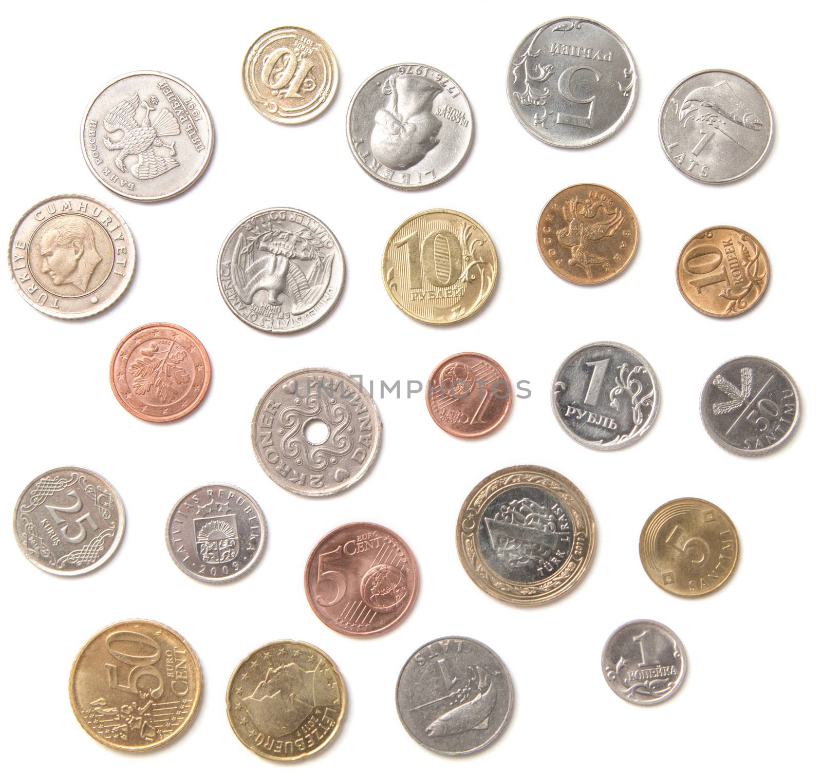 Various coins from different countries isolated over white