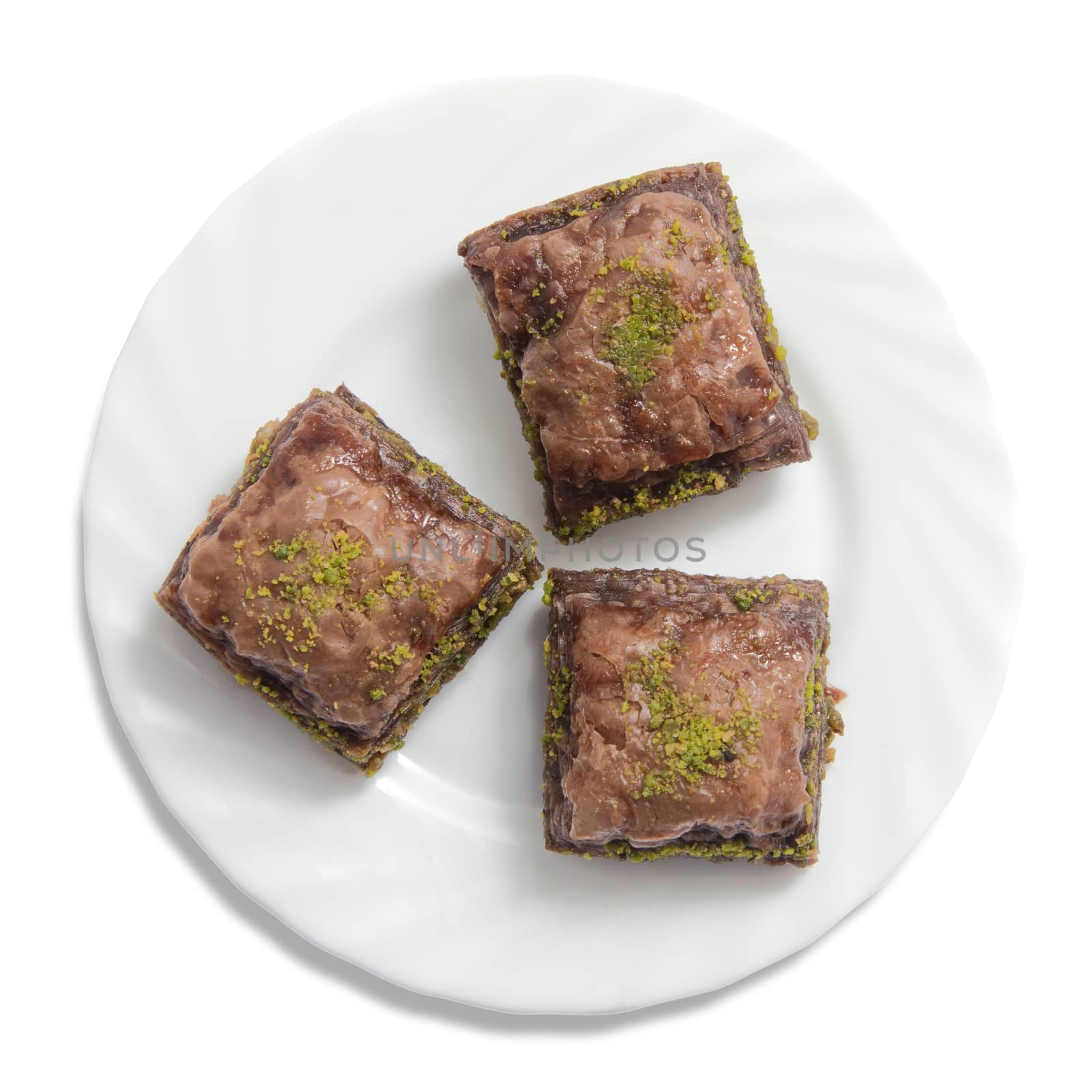 Plate with turkish baklava isolated over white background