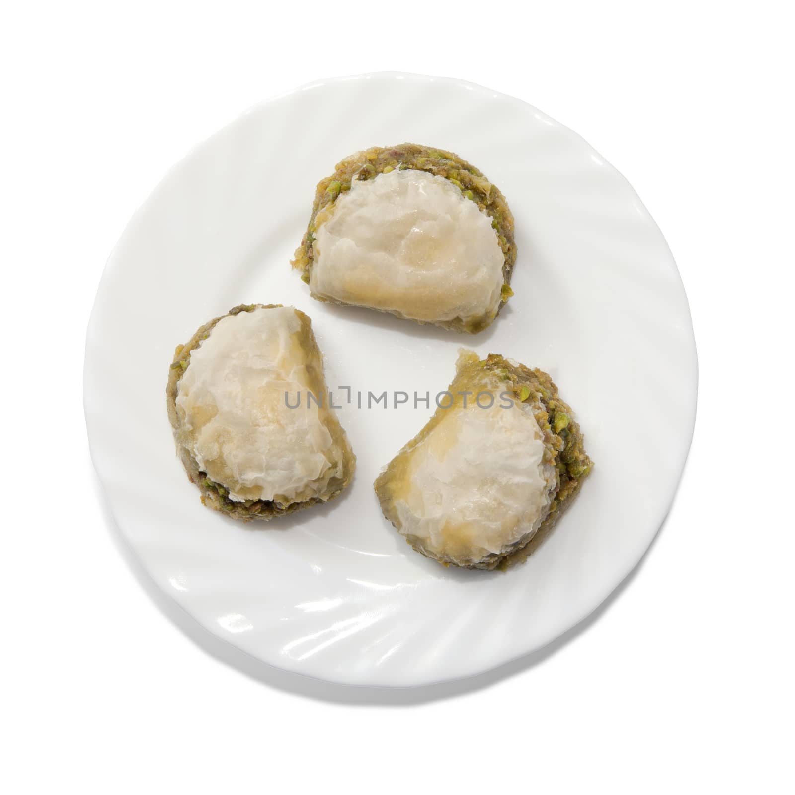 Plate with turkish baklava isolated over white background