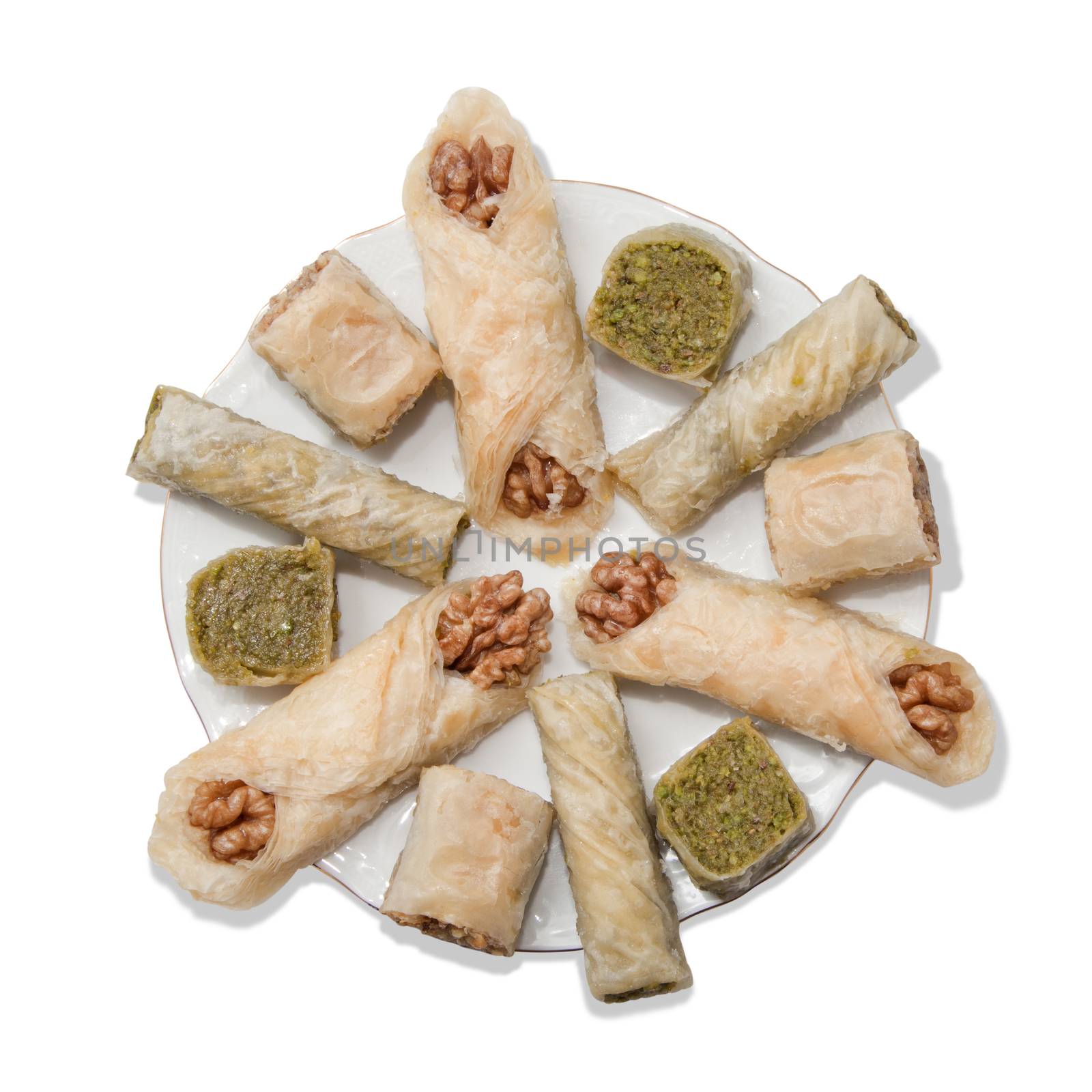 Plate with turkish baklava isolated over white background