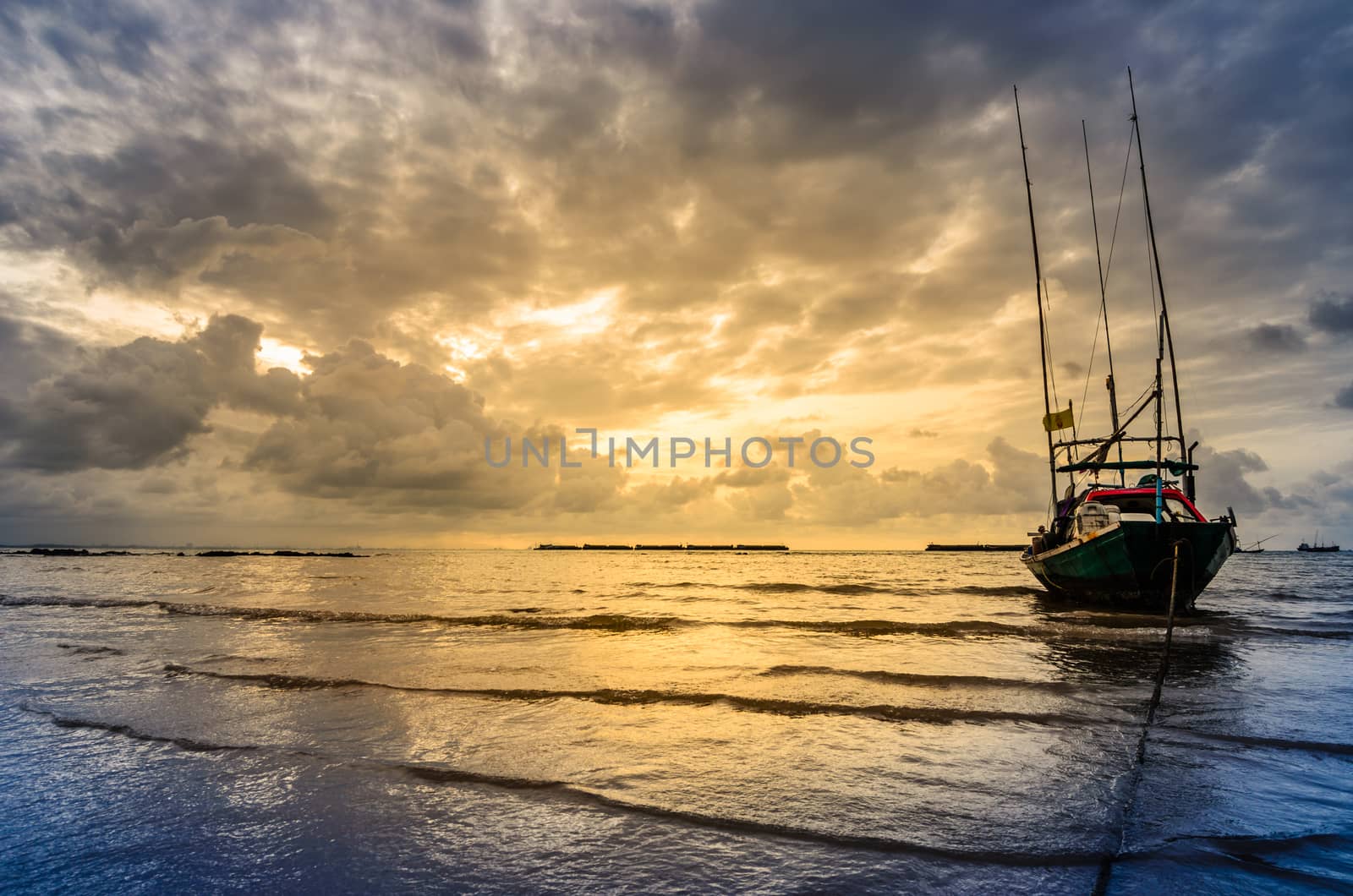 Fishing sea boat and Sunrise clouds before strom in Thailand blue  light tone