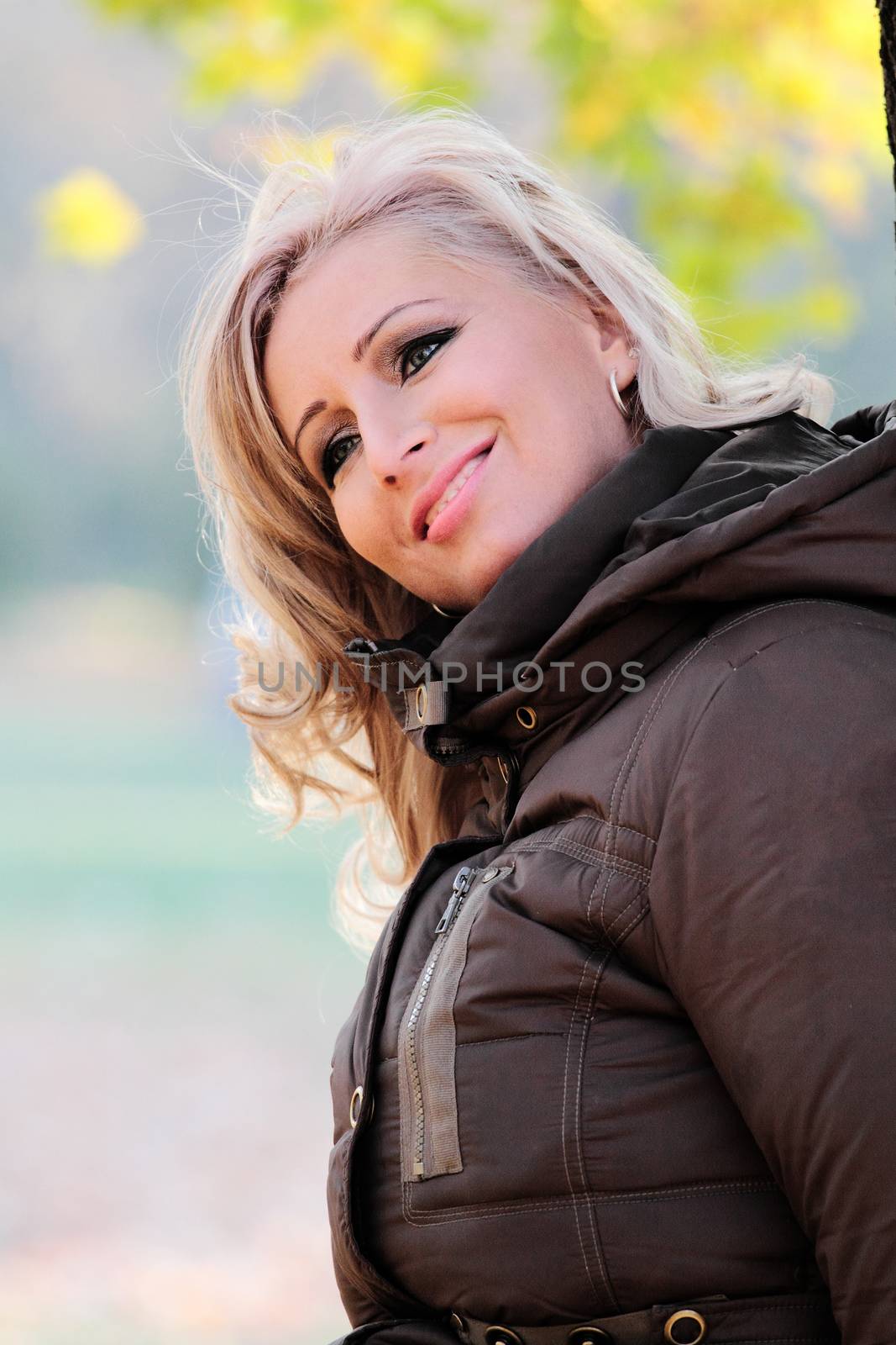 Portrait of a blond woman in autumn