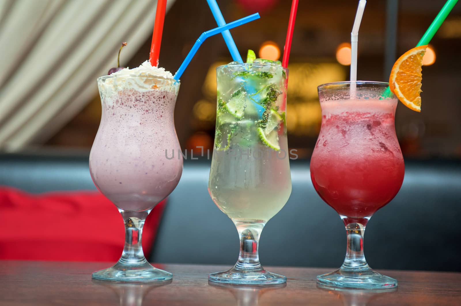 Set of three healthy nonalcoholic cocktails berries and classic mohito