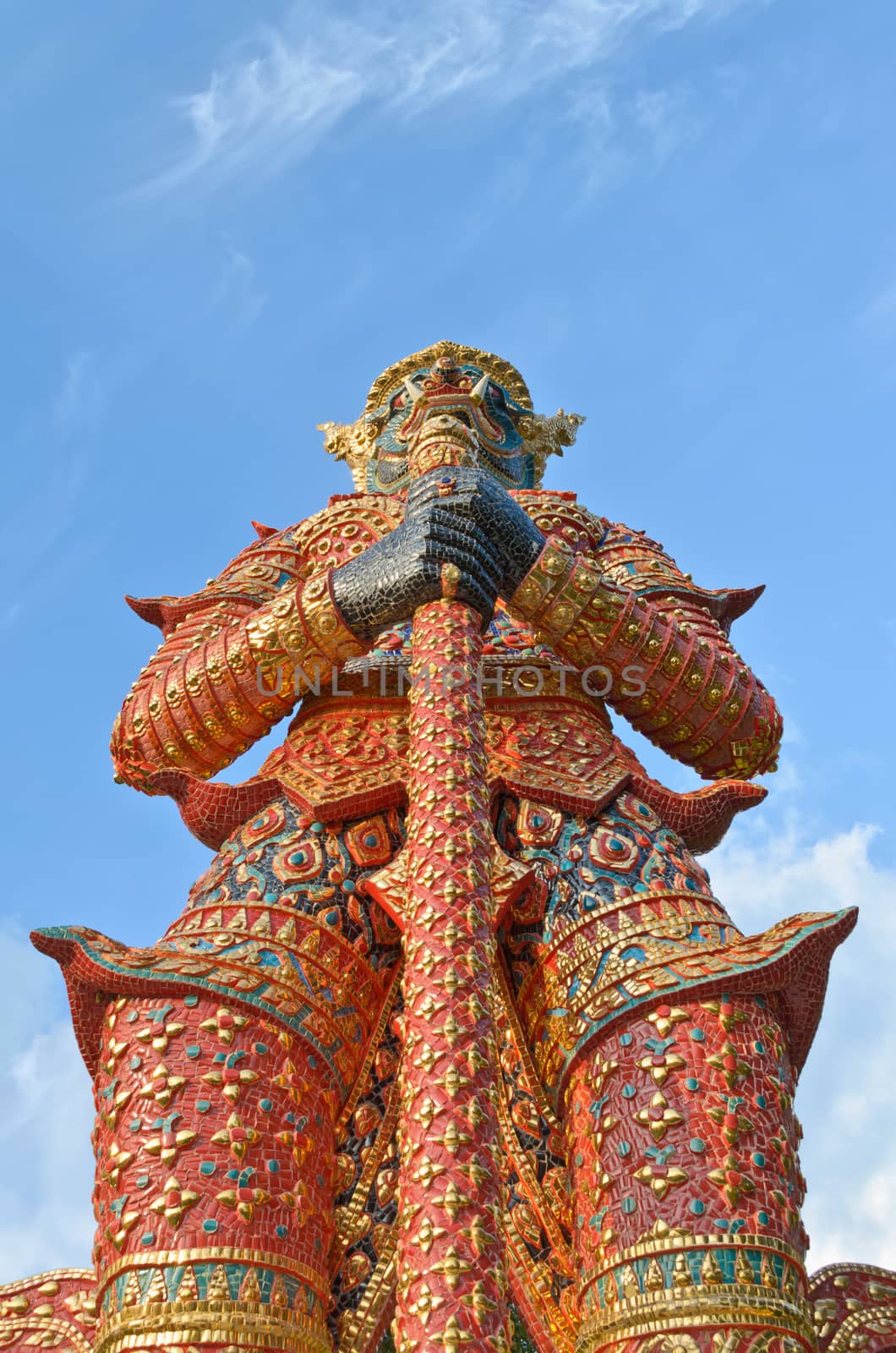 Giant statue holding a baton concierge of temple Thailand