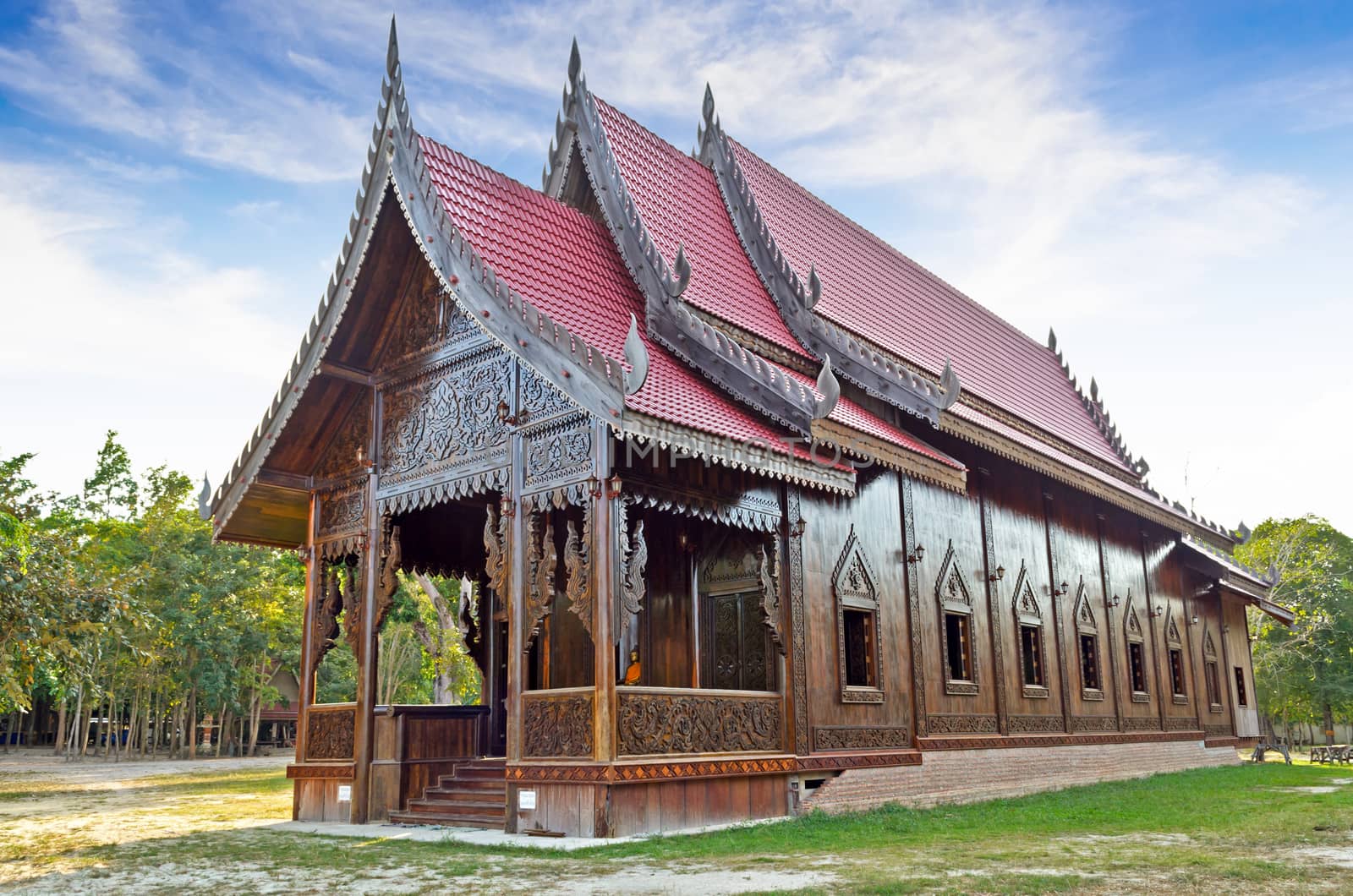 Chapel of Thai temple handmade from palm wood 