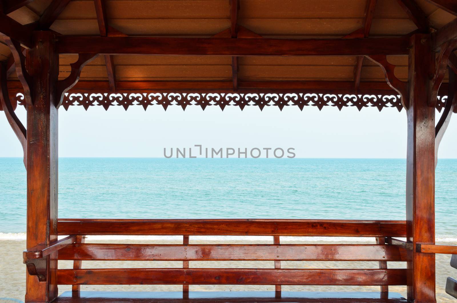 Pavilion seating area for relaxing to enjoy the beautiful blue sea.
