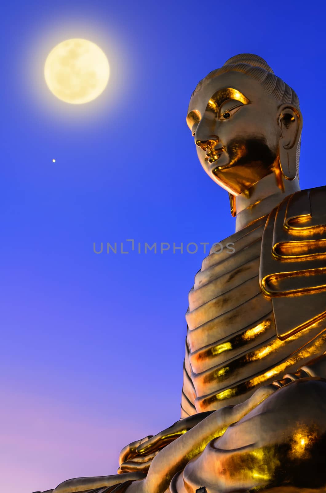 Phra Phuttha Kitti Siri Chai, Buddha statue under the full moon on the Thongchai mountain at Ban Krut in Prachuap Khiri Khan Province of Thailand