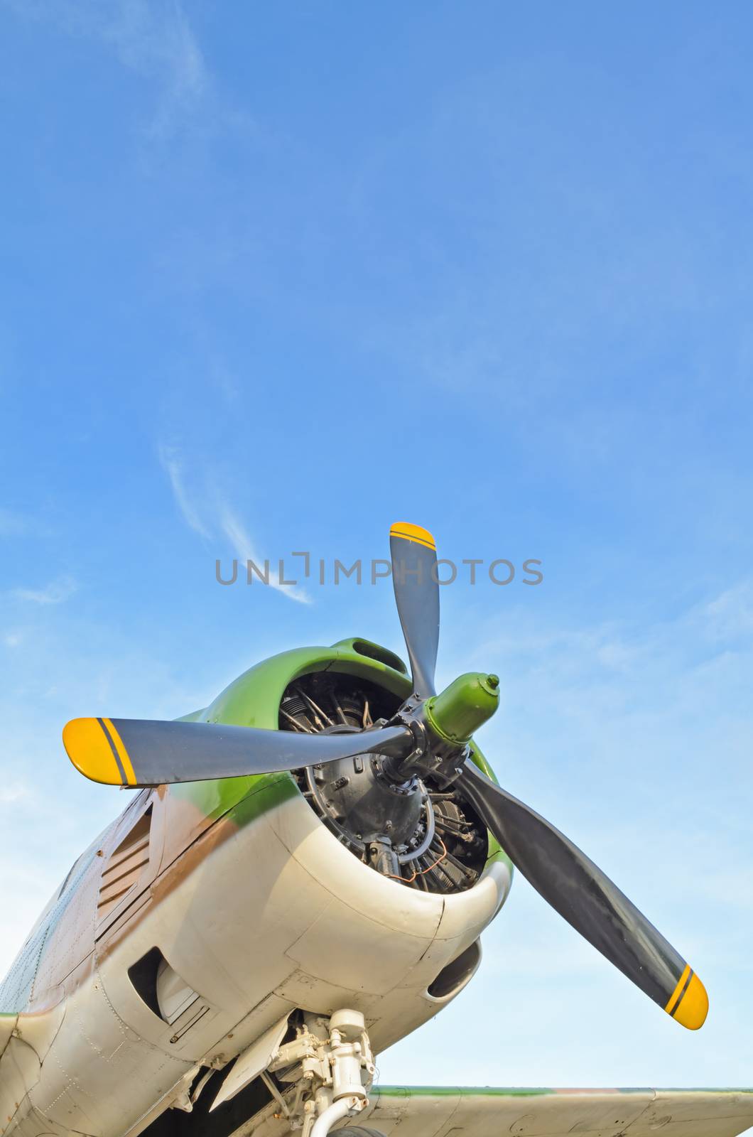 Old fighter aircraft used in world war 2 of Thailand on blue sky background
