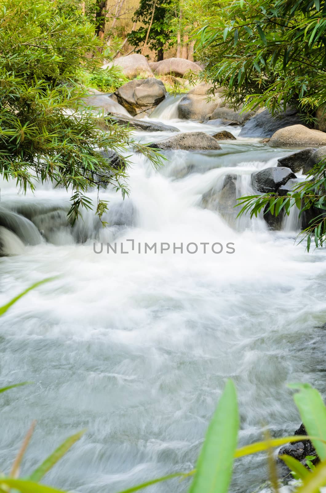 Kaeng Som Maw, Small waterfall at tropical forests in Ratchaburi Province of Thailand.
