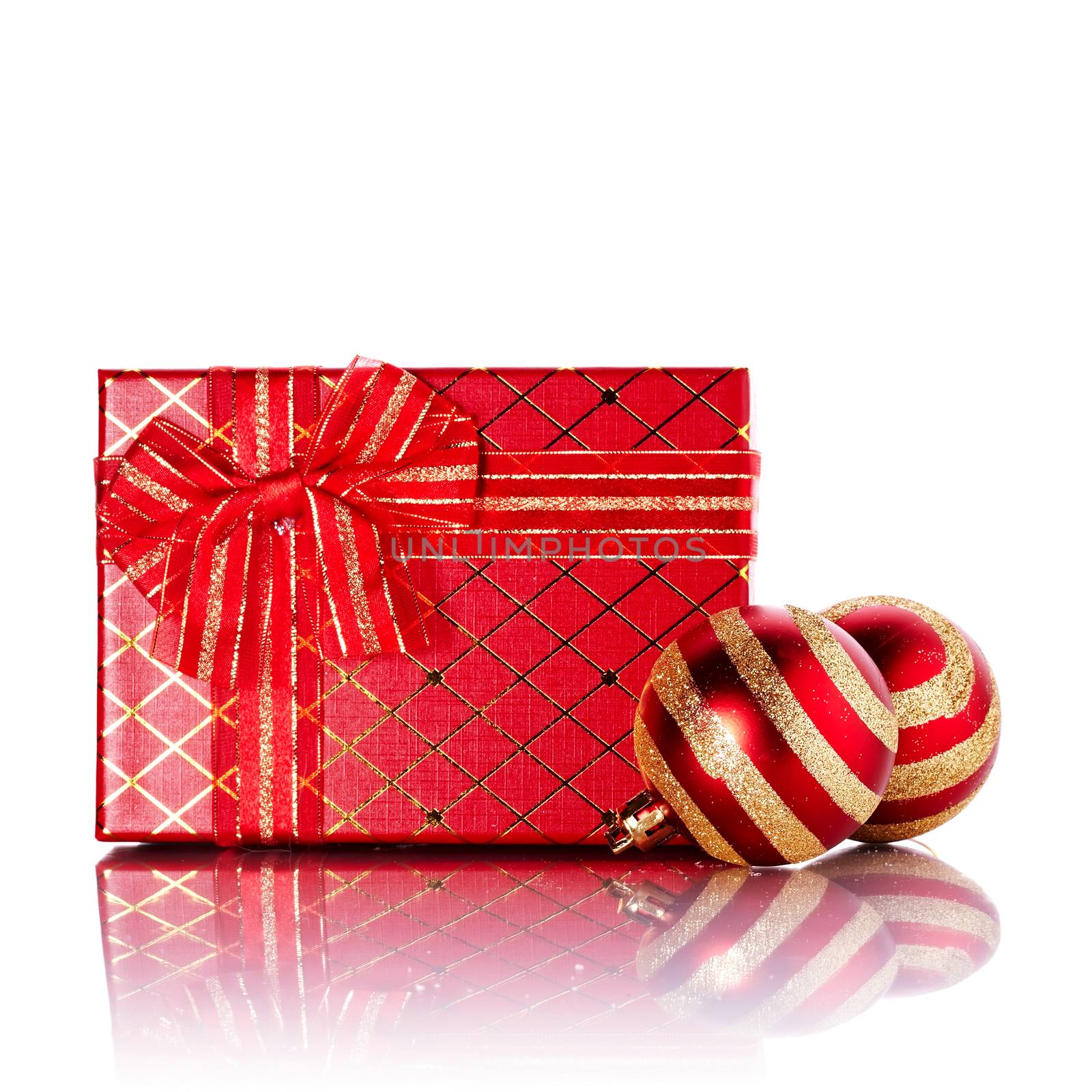 New Year's striped red balls and gift. by Azaliya