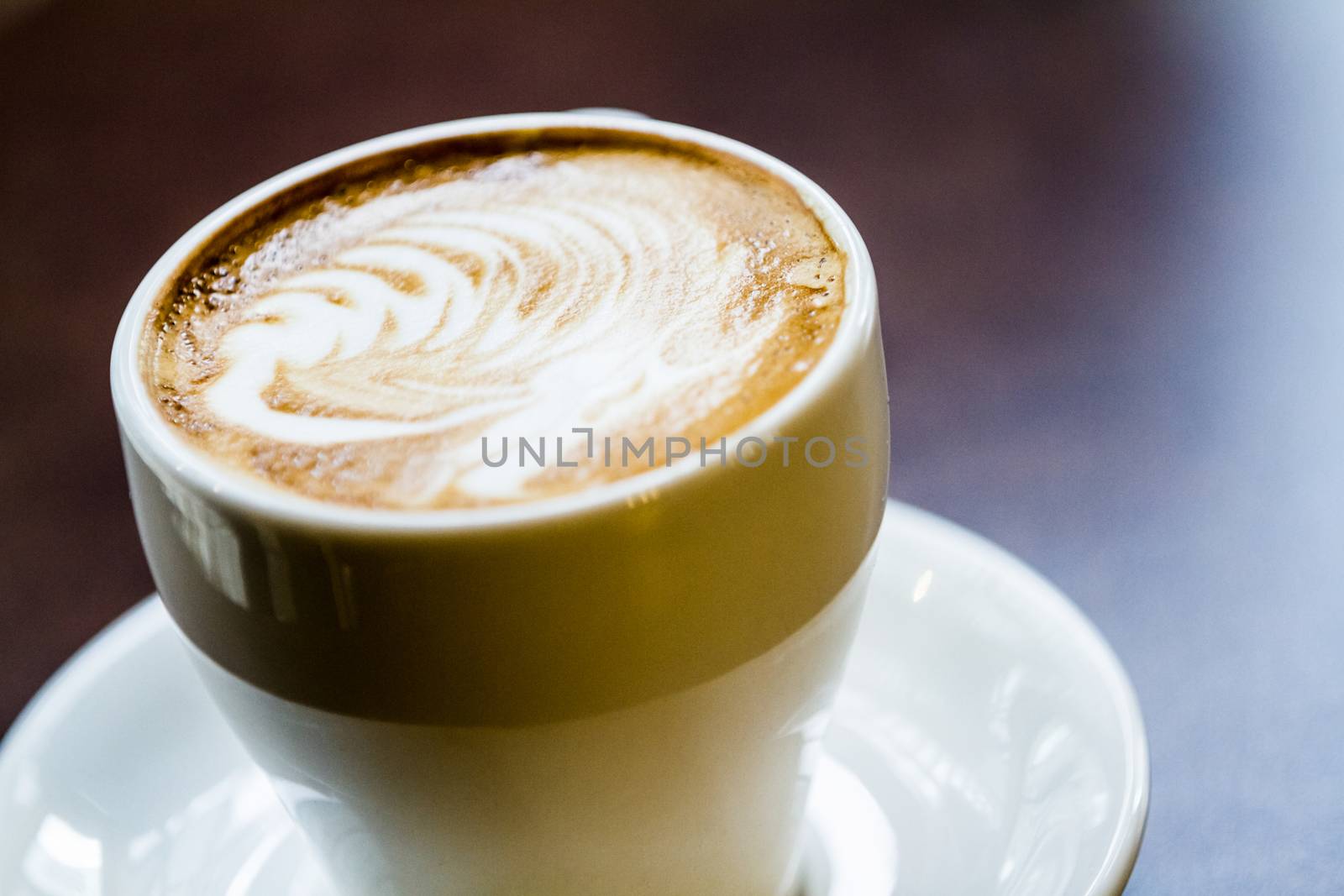 Latte Coffee on a table by aetb