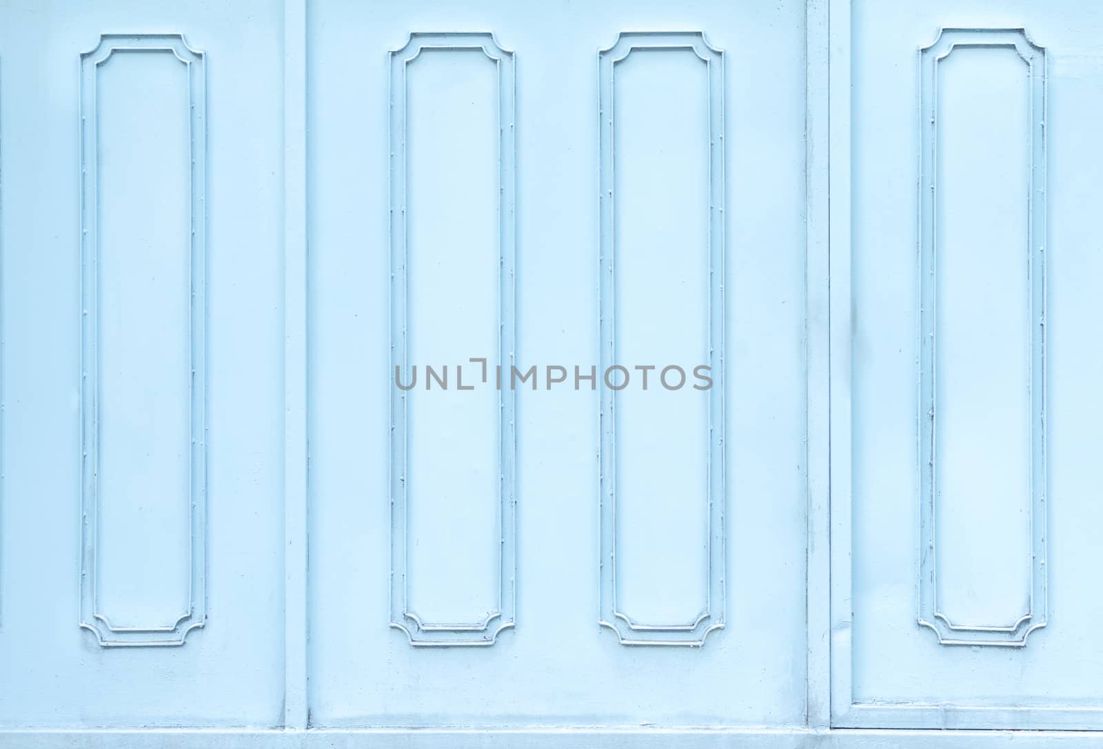 Close up blue metal or iron gate .
