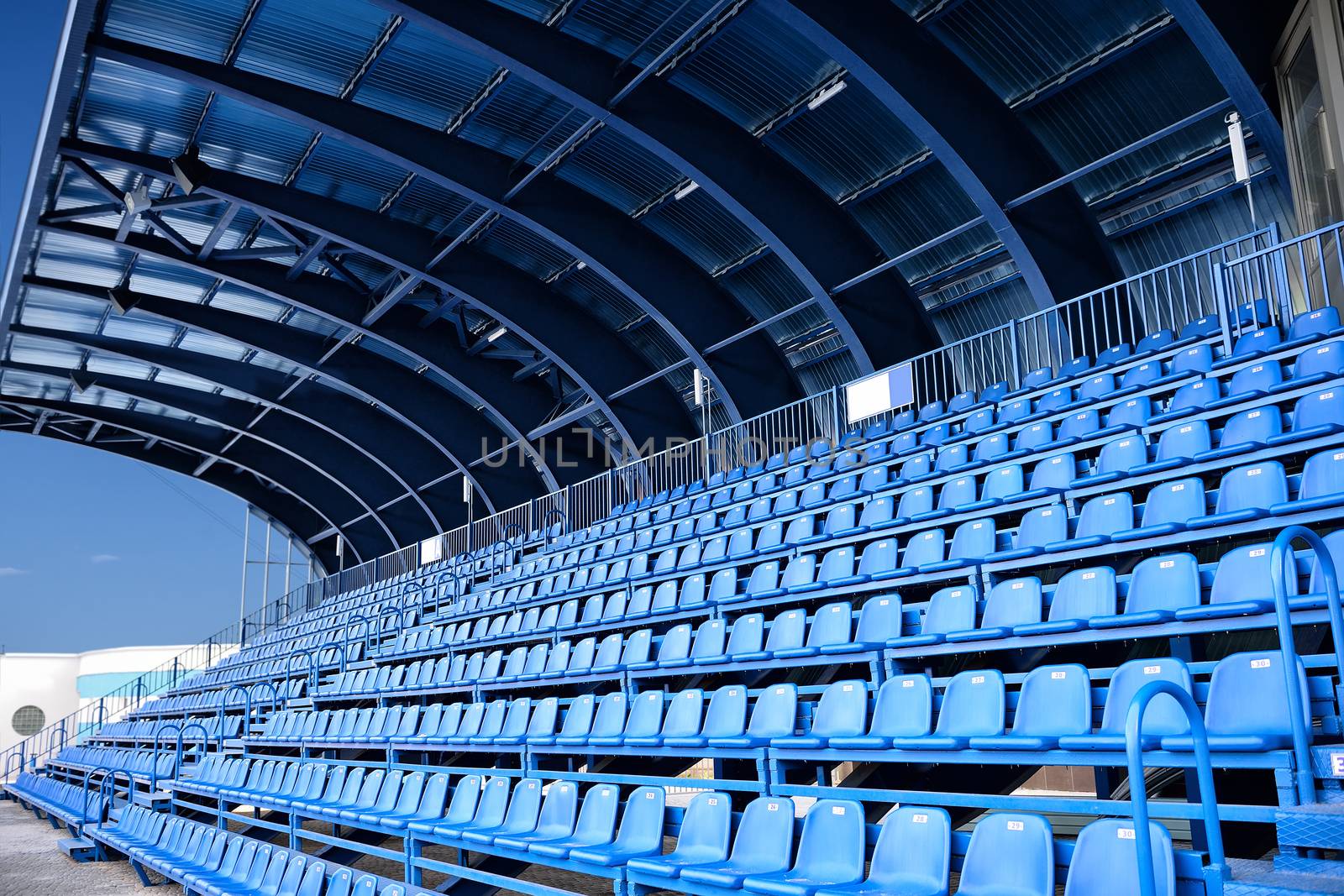 empty blue seat at Stadium by Draw05