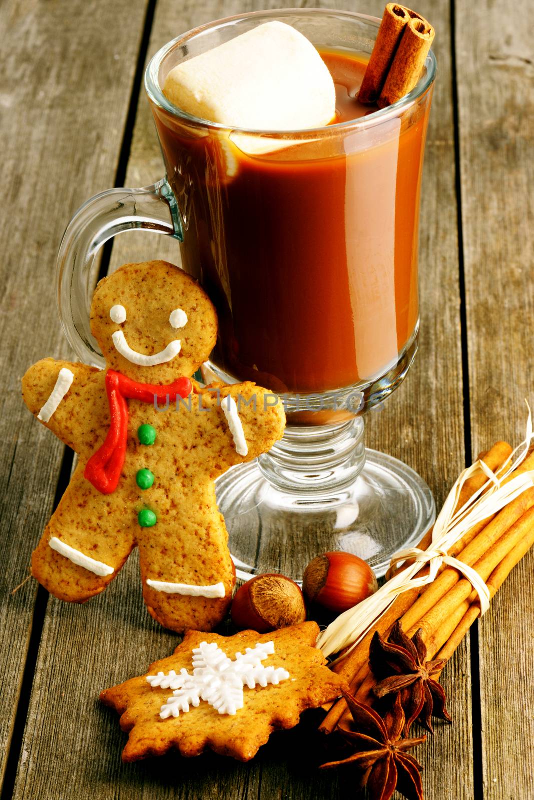 Glass of hot chocolate on wooden table