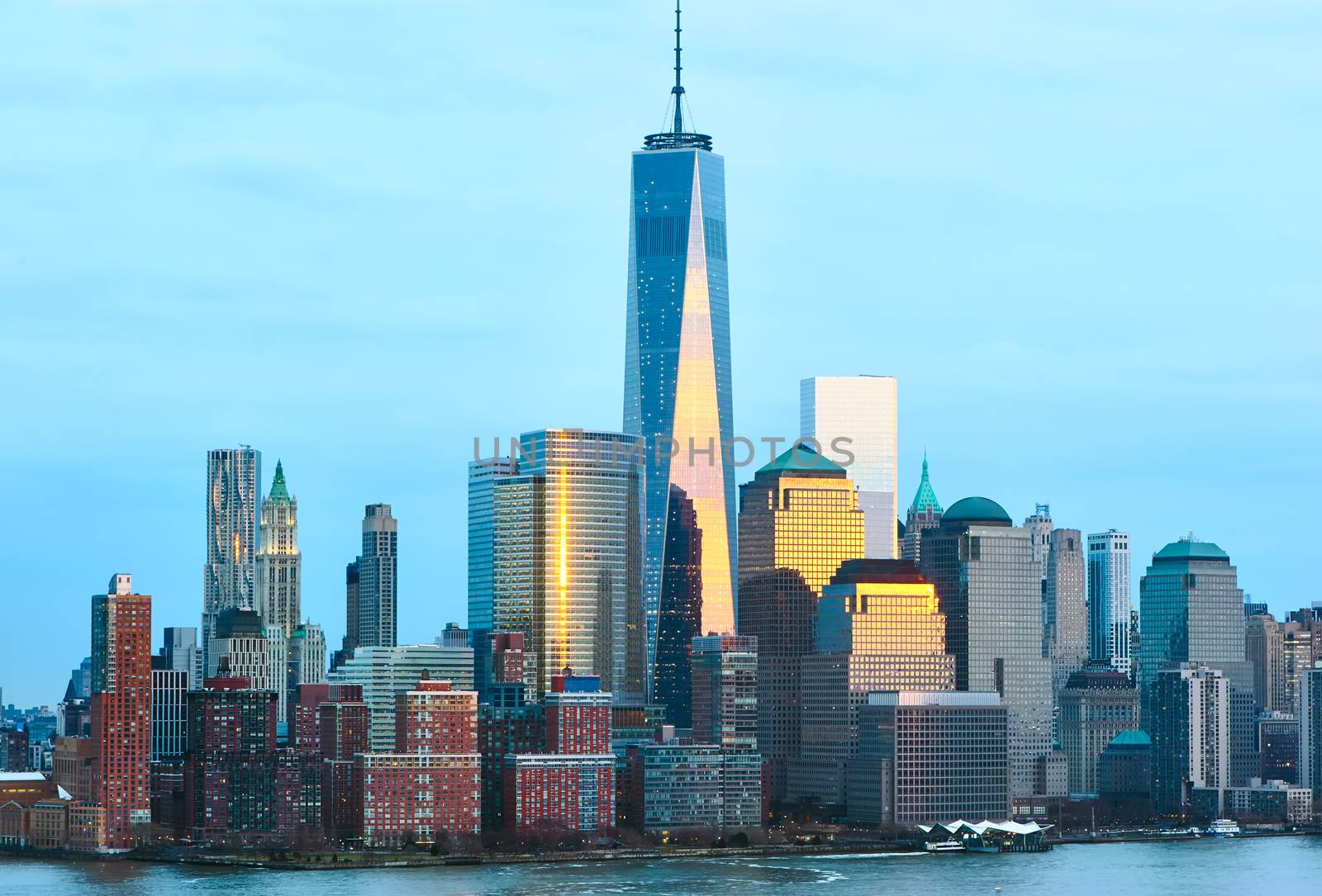 New York City Manhattan skyline with One World Trade Center Tower (AKA Freedom Tower) over Hudson River viewed from New Jersey