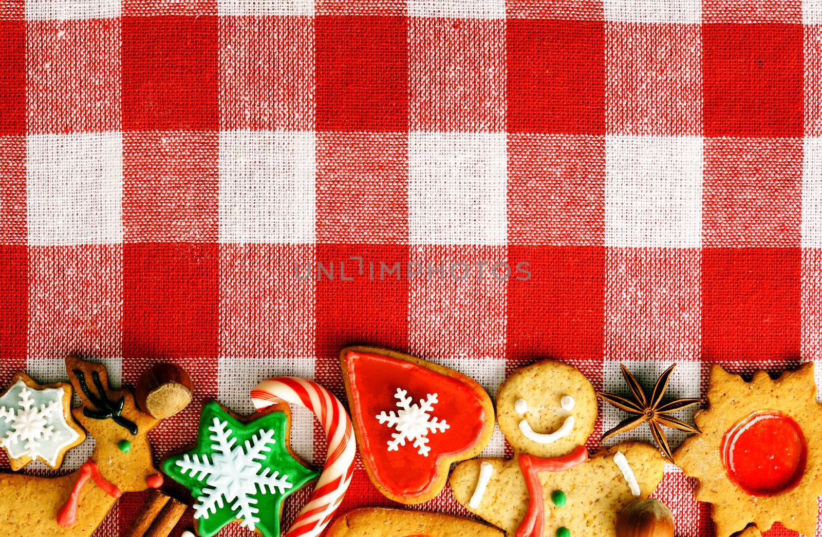 Christmas gingerbread cookies over tablecloth