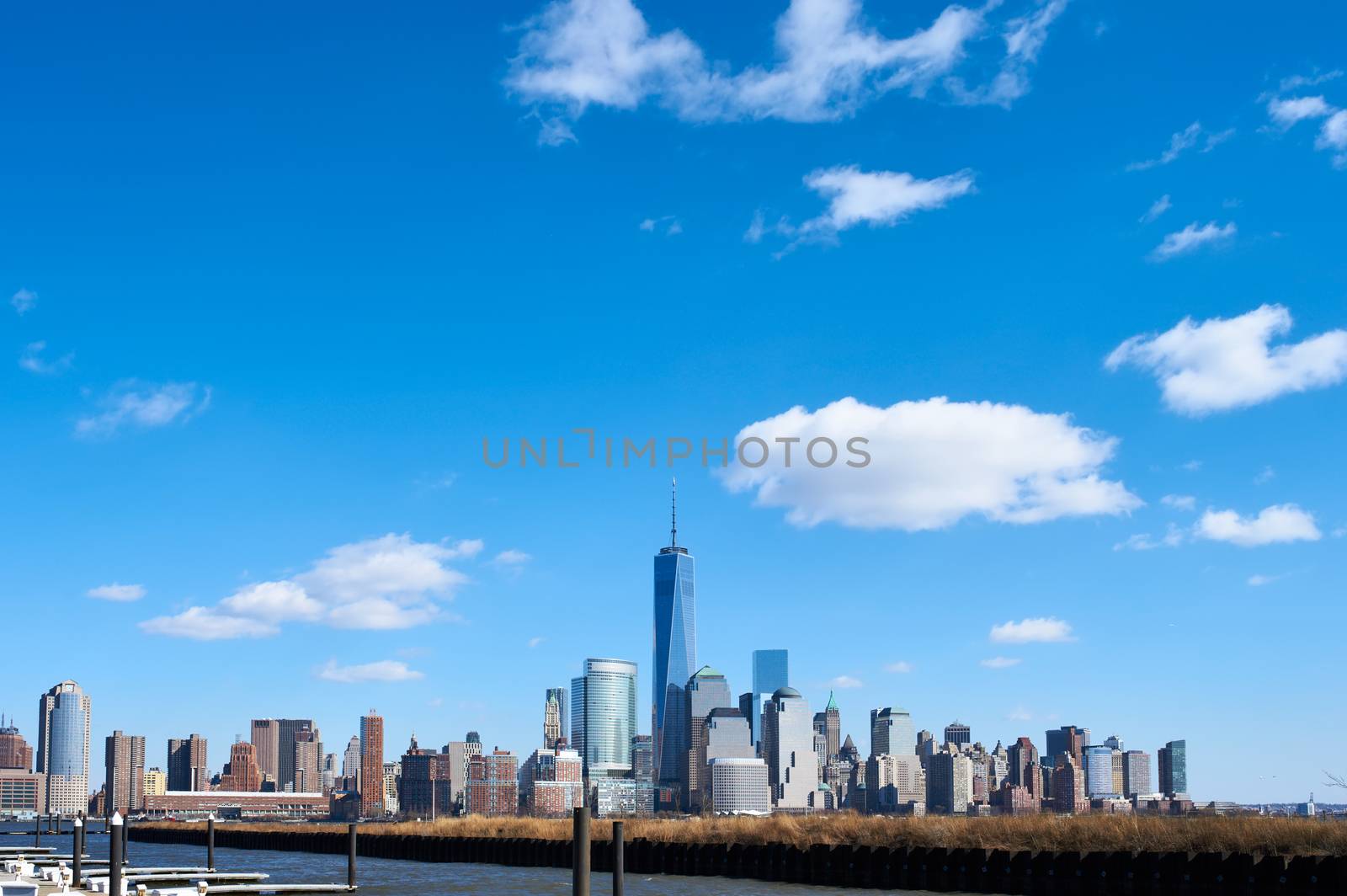 New York City Manhattan skyline with One World Trade Center Tower (AKA Freedom Tower) over Hudson River viewed from New Jersey