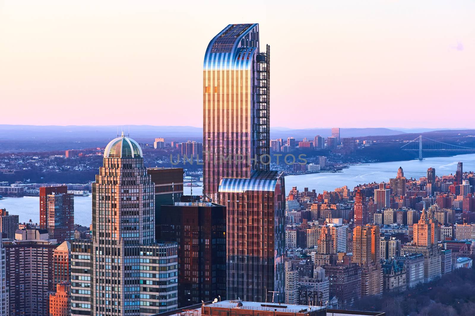 Cityscape view of Manhattan, New York City, USA at sunset