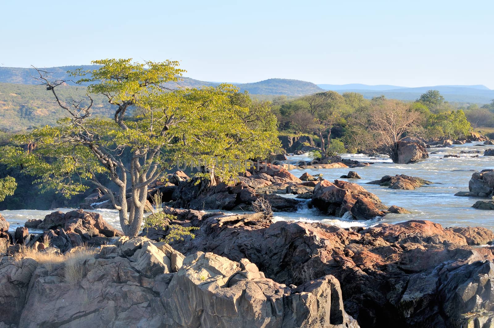 Top of of the Ruacana waterfalls, Namibia at sunset
