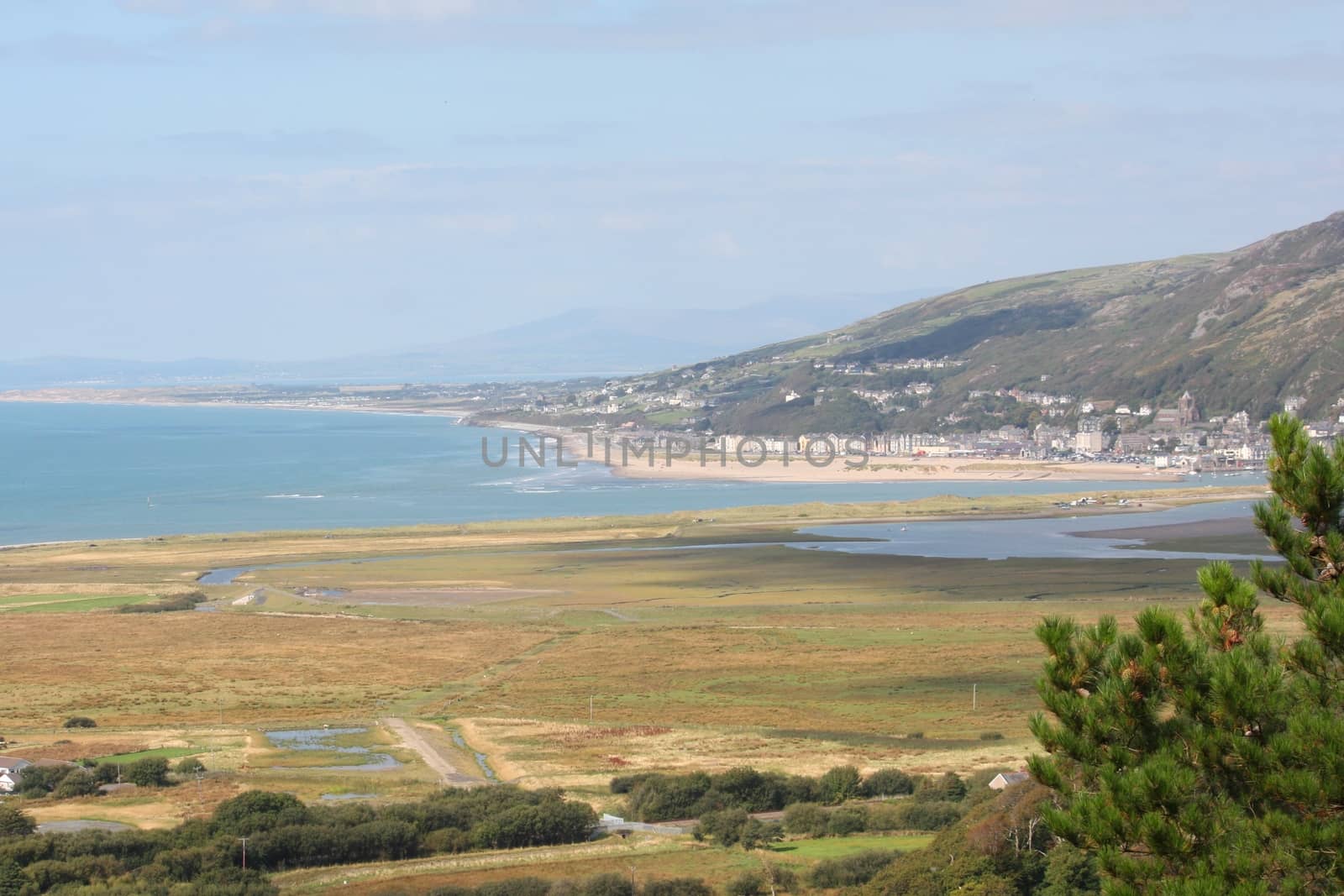 a view over sunny cardigan bay from the hills above