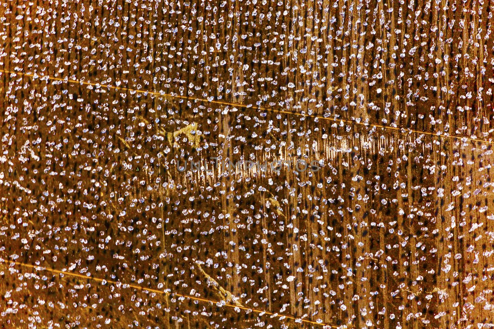 911 Memorial Pool Blue Waterfall Droplets Patterns Abstract New York NY.  Pool is in the foundation of one of the Two World Trade Center Buildings.  Water falls into hole of the foundation.  