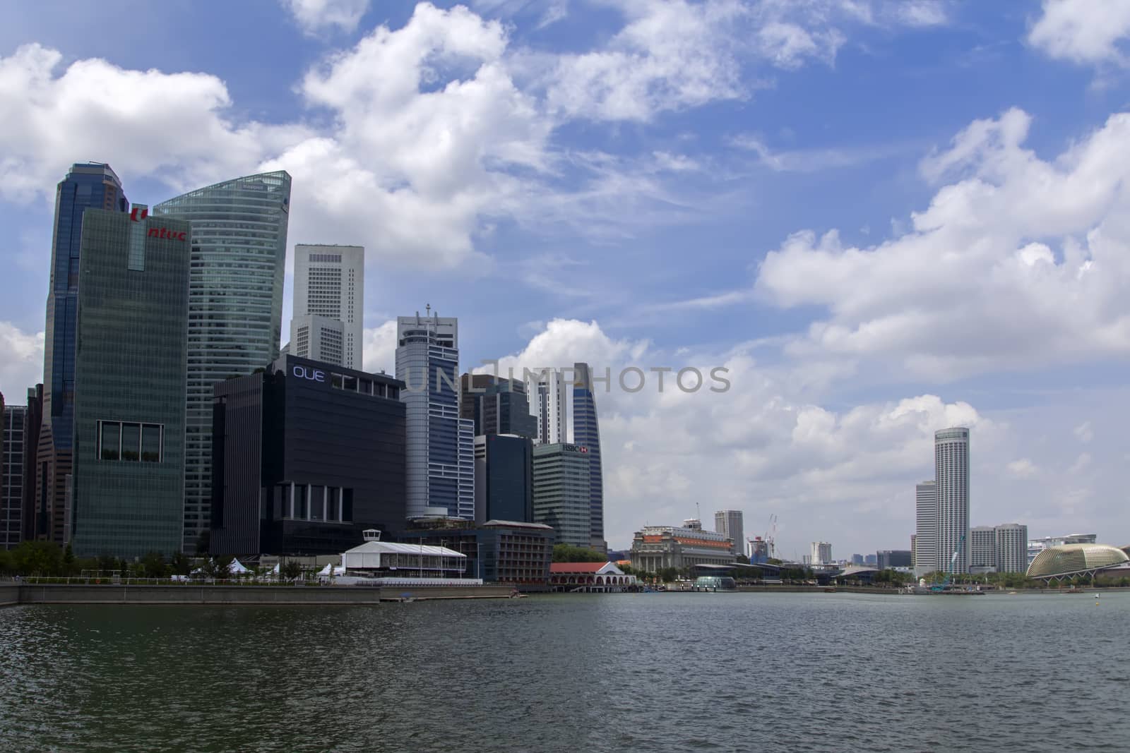 Singapore Skyscrapers Seaside Promenade. Afternoon in City  EDITORIAL Singapore, Singapore - February 13, 2014