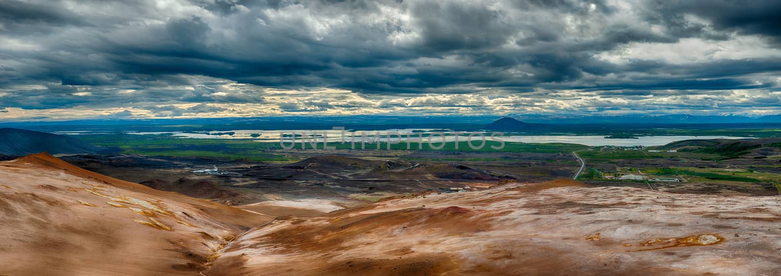 View from the top of the Namafjall, the vivid volcanic mountain, at the lake Myvatn, Iceland. HDR panorama