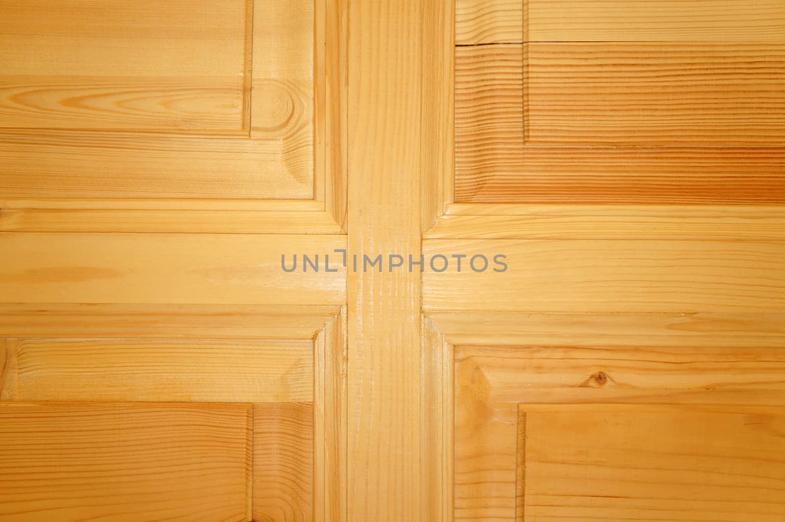 The texture of the new unpainted wooden door as background