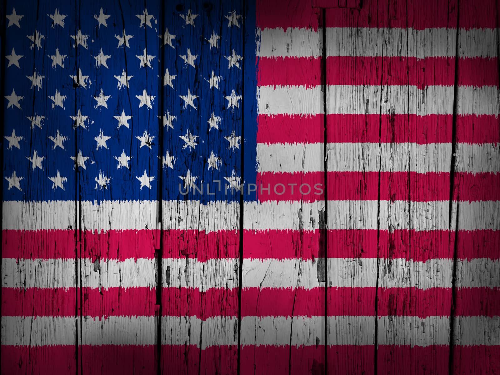 United States Of America grunge background with usa flag painted on wooden aged wall.