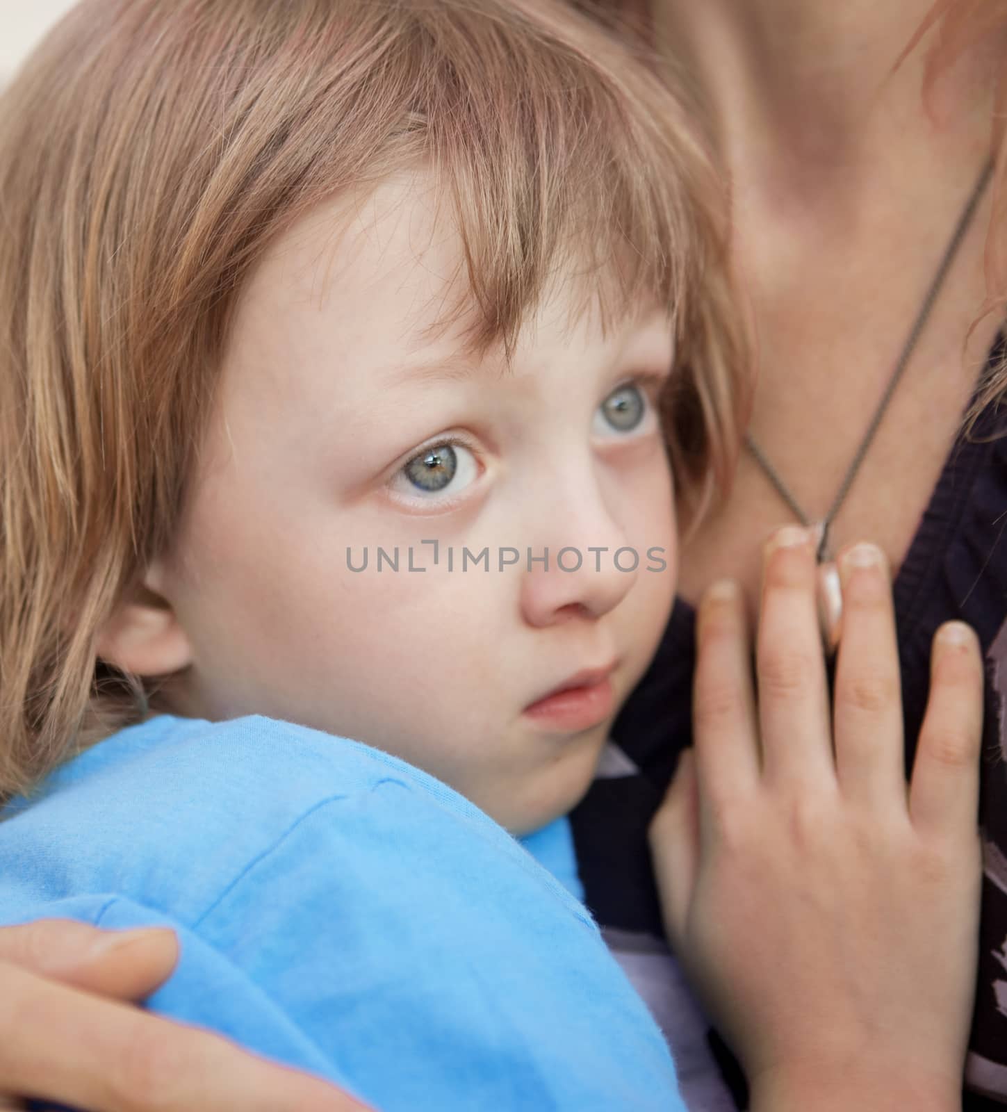 Boy Embracing his Mother, Sitting on her Lap